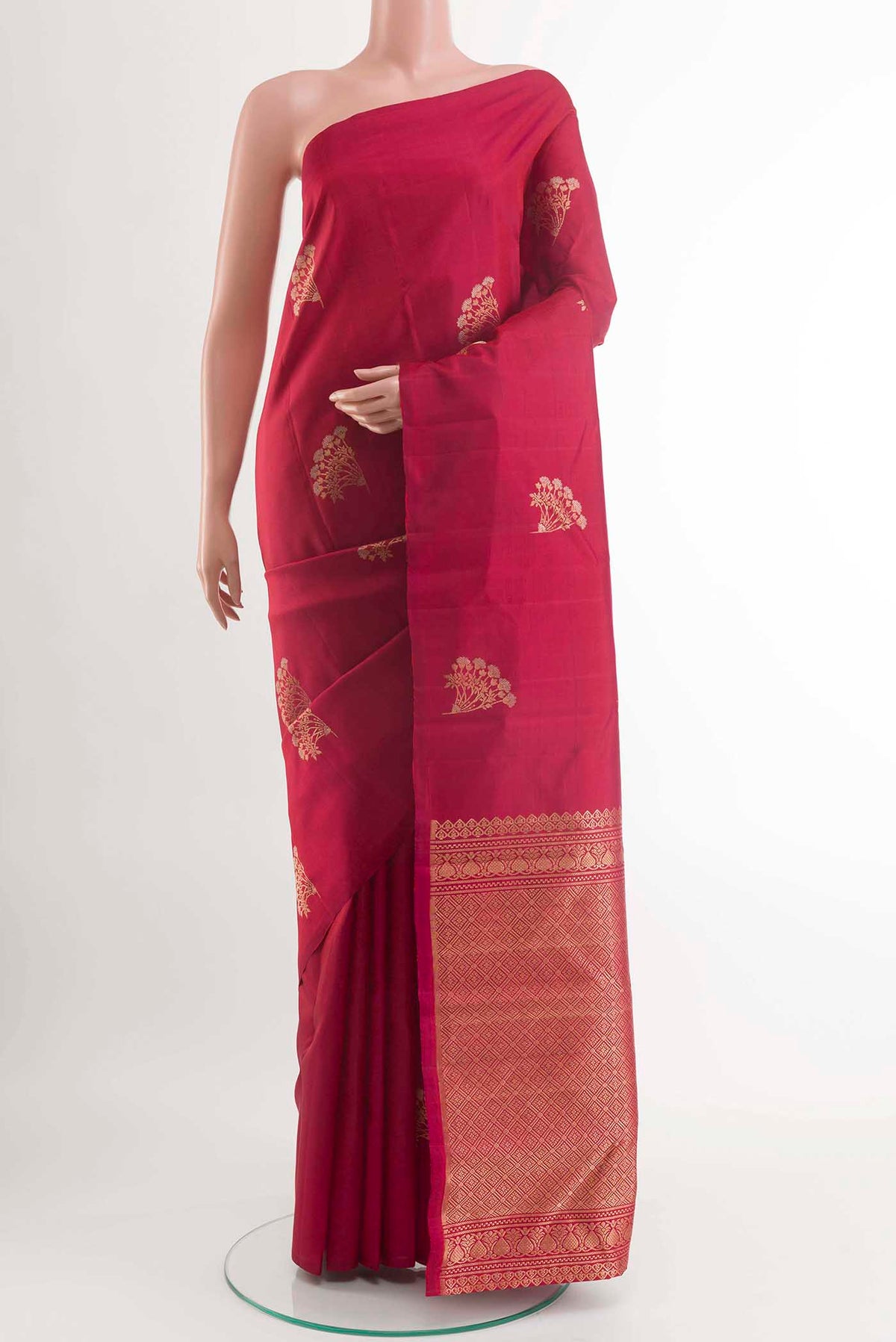 Maroon Kanchipuram Silk Saree with Zari Butta on the body and Zari Border displayed on a mannequin