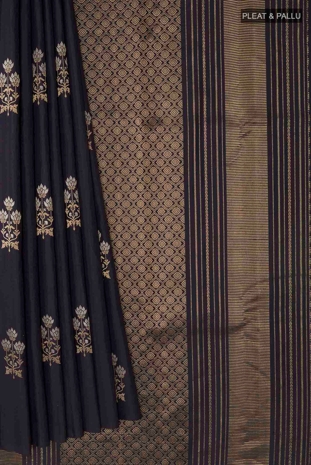Pleats and pallu of Dark Blue Kanchipuram Silk Saree with Zari Butta on the body and Zari Border
