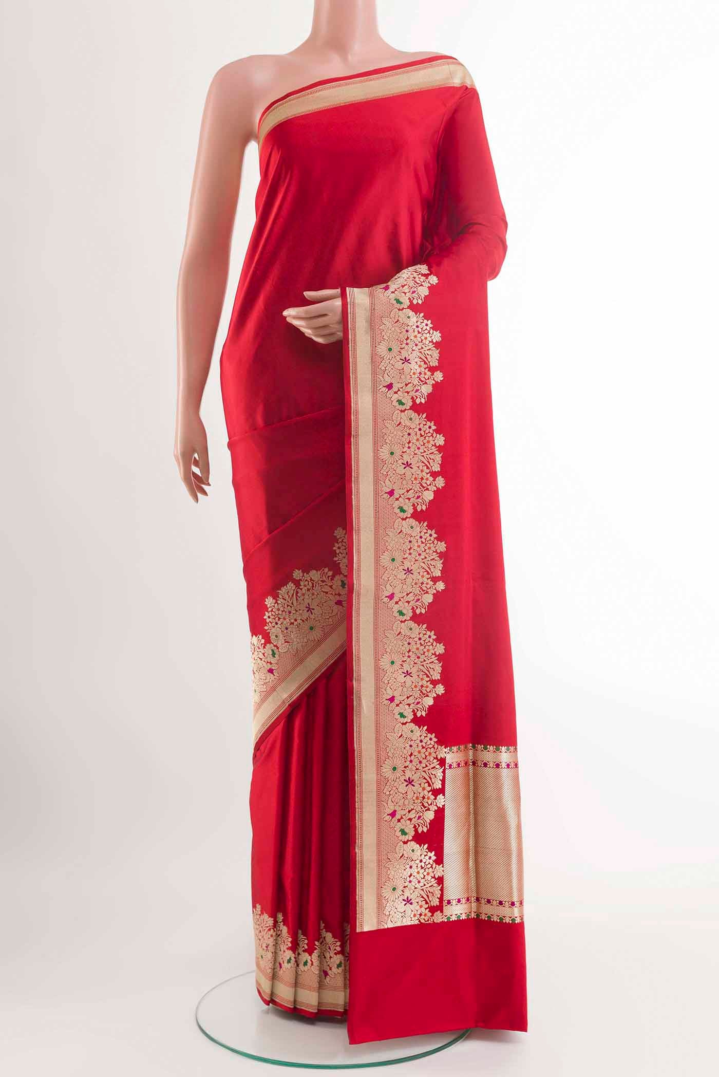 Red Banarasi Silk Saree with Plain Body and Zari Border displayed on a mannequin