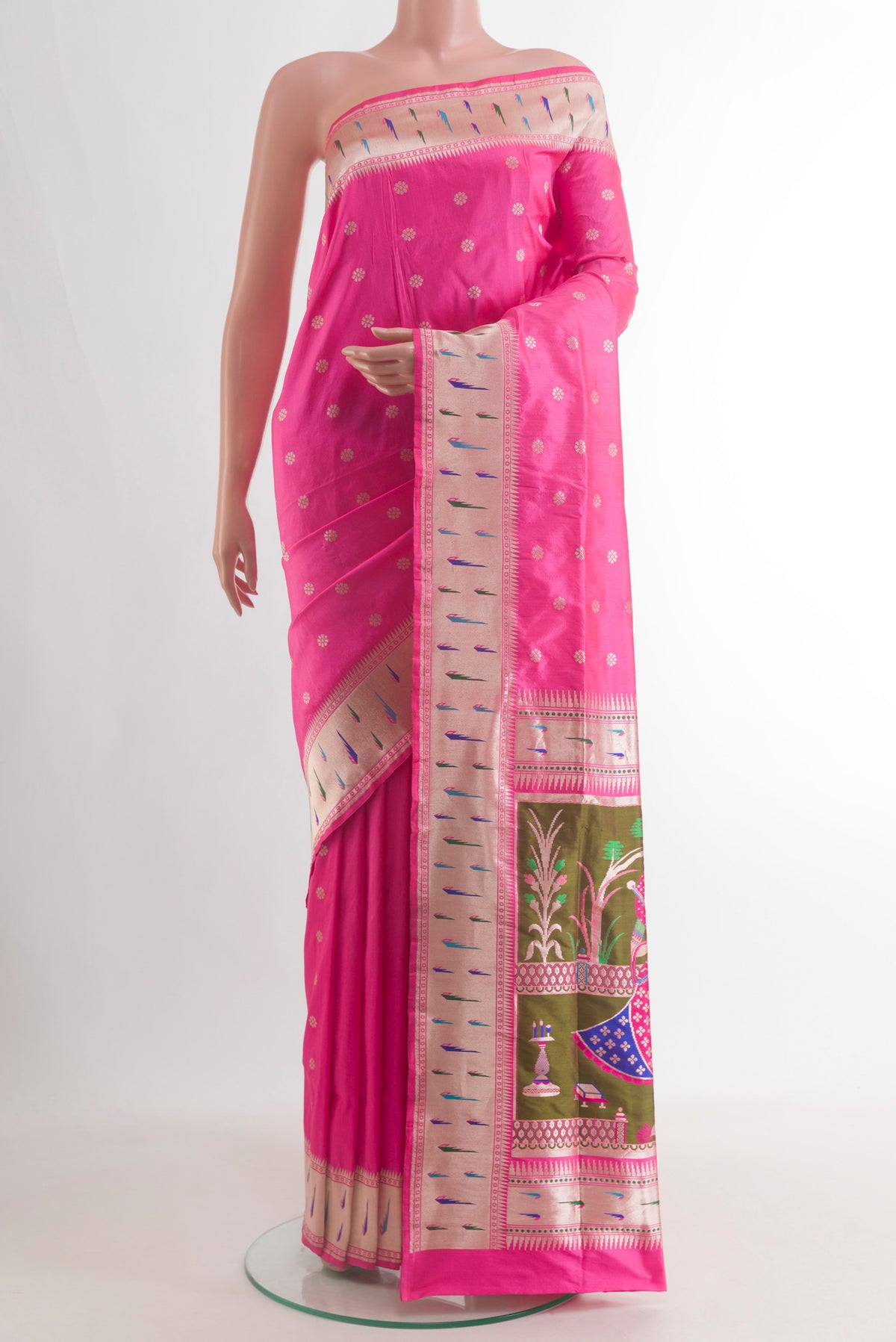 Pure Silk Pink Banarasi Saree with Zari Butta on the body and Paithani Border.  displayed on a mannequin