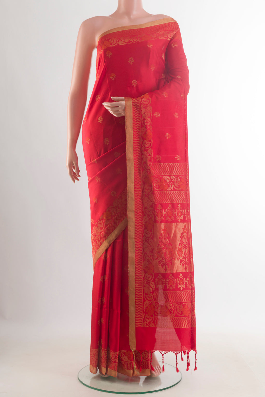 Pure Silk Red Soft Saree with Zari Butta on the body and Zari Border.  displayed on a mannequin