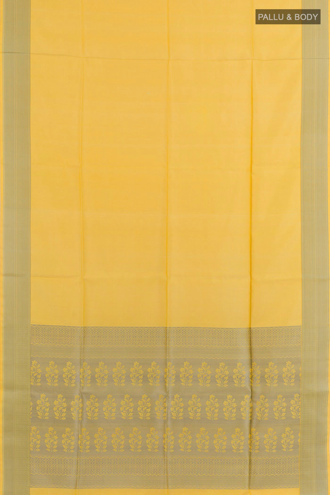 Flat view of Yellow Soft Silk Saree with Jacquard design on the body and Zari Border. 