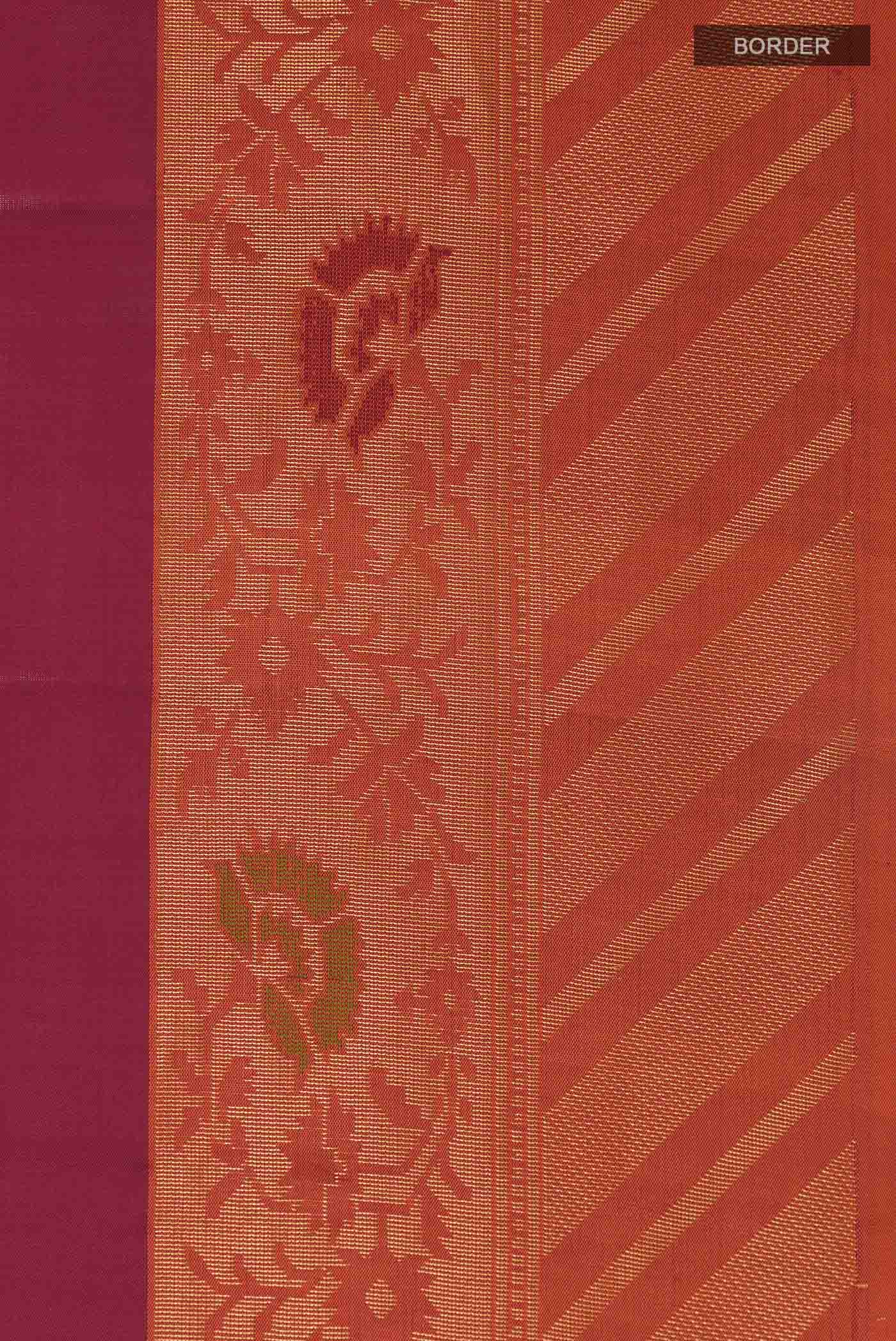 Border image of Maroon Soft Silk Saree with Zari Butta on the body and Zari Border