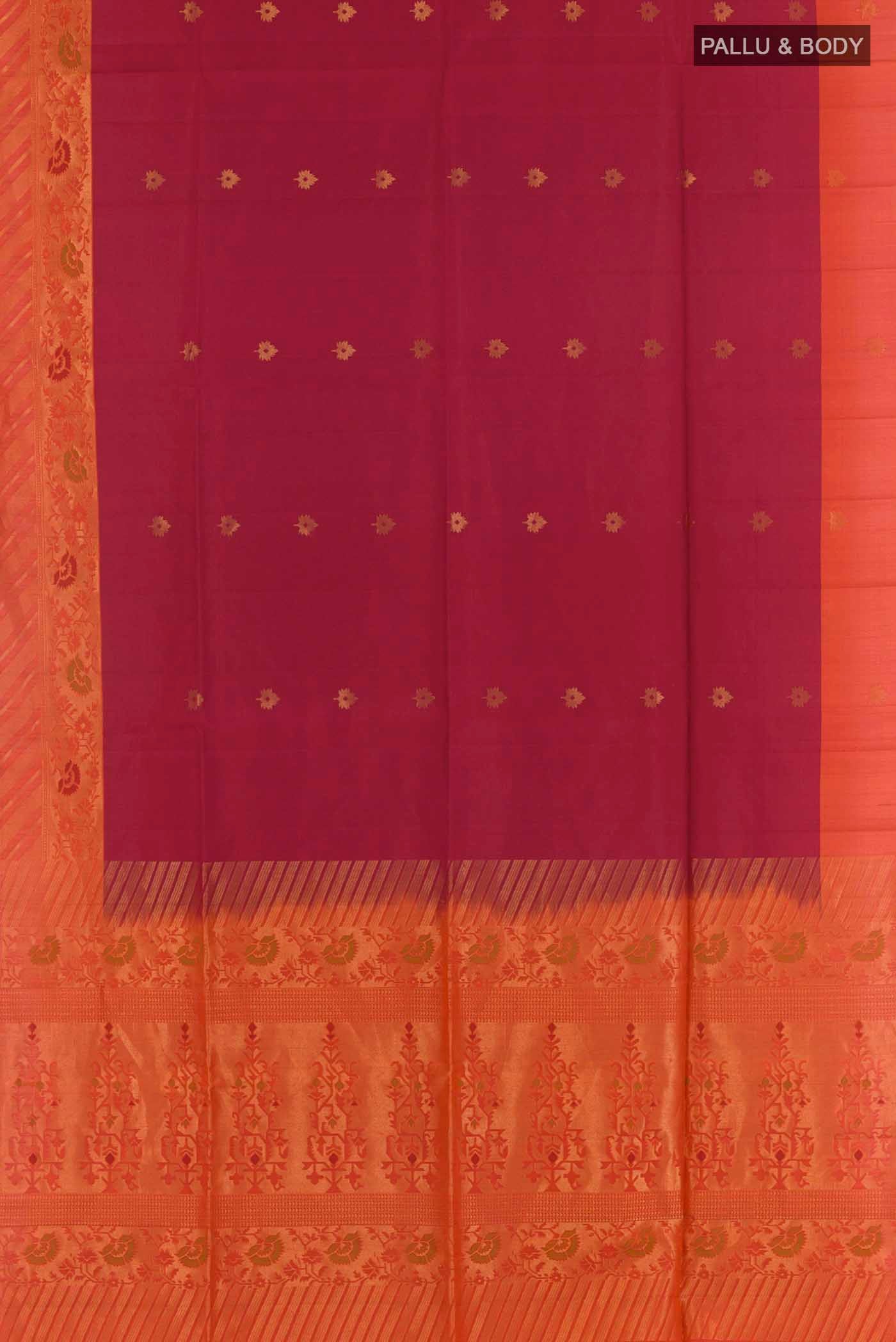 Flat view of Maroon Soft Silk Saree with Zari Butta on the body and Zari Border
