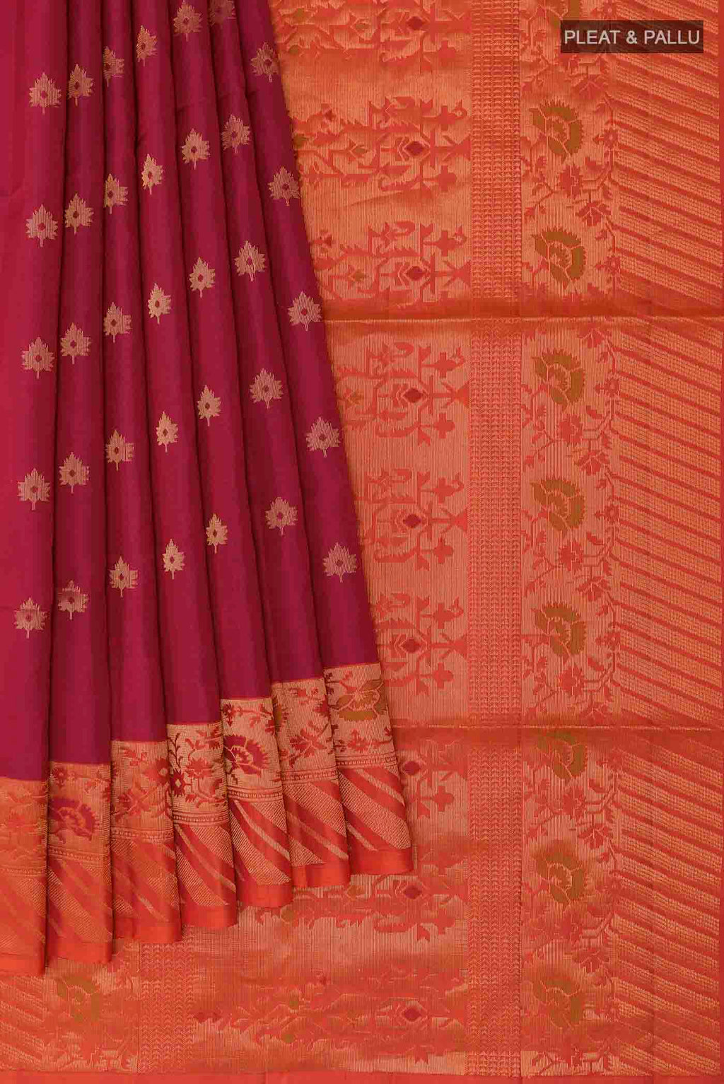 Pleats and pallu of Maroon Soft Silk Saree with Zari Butta on the body and Zari Border