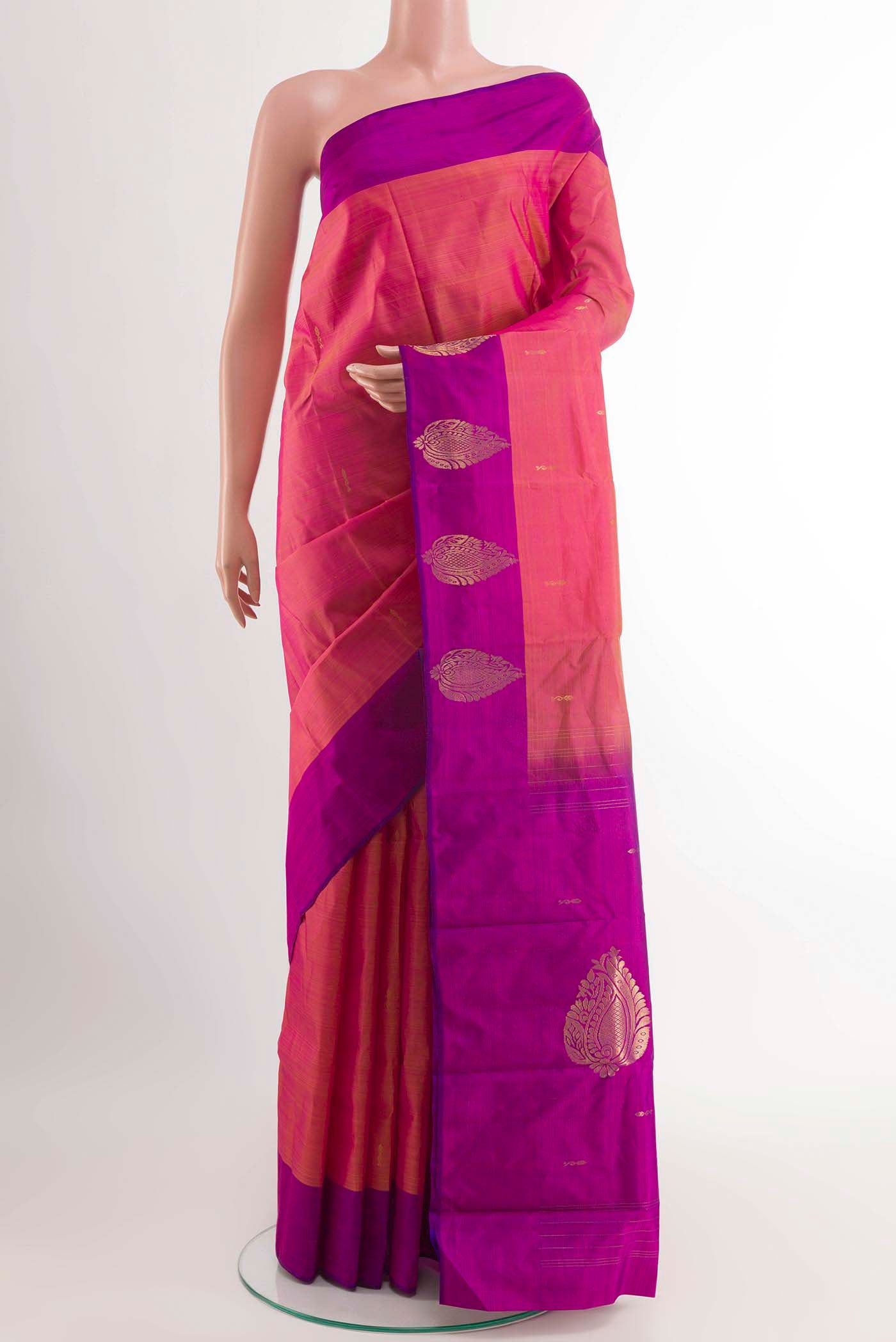 Pink Kanchipuram Silk Saree with Zari Butta on the body and Zari Border displayed on a mannequin