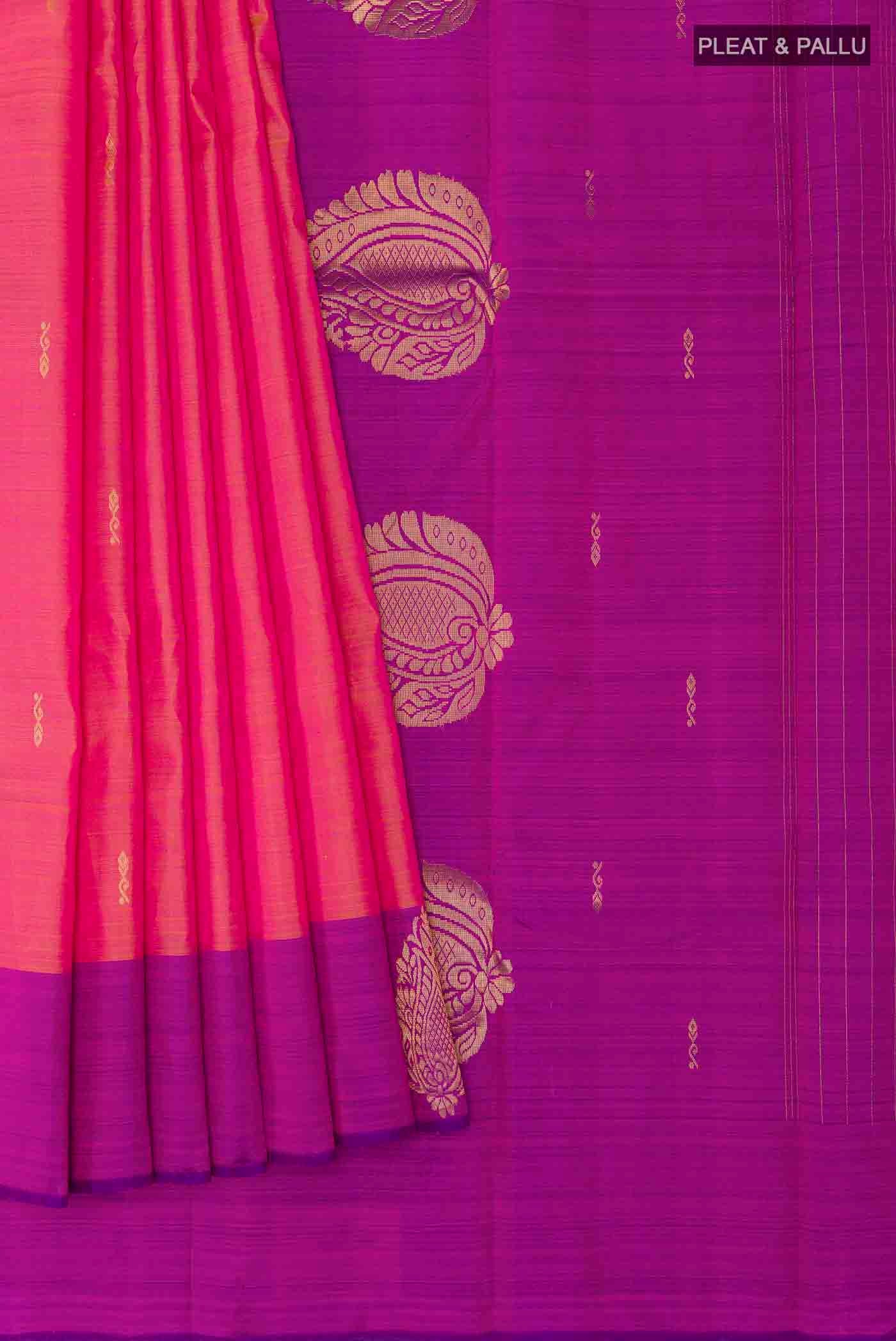 Pleats and pallu of Pink Kanchipuram Silk Saree with Zari Butta on the body and Zari Border