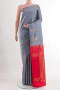 Grey Kanchipuram Silk Saree with Zari Butta on the body and Zari Border displayed on a mannequin