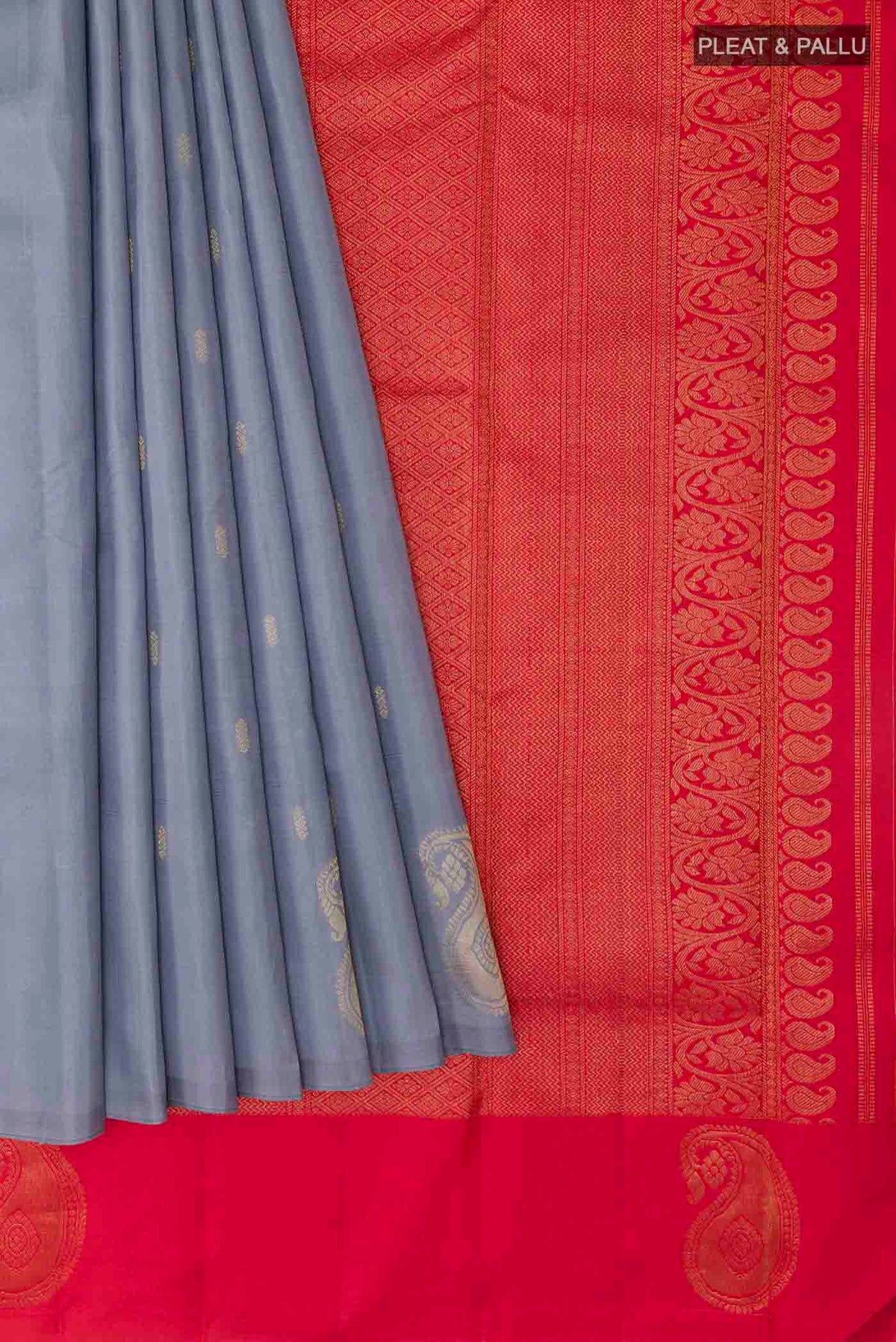 Pleats and pallu of Grey Kanchipuram Silk Saree with Zari Butta on the body and Zari Border