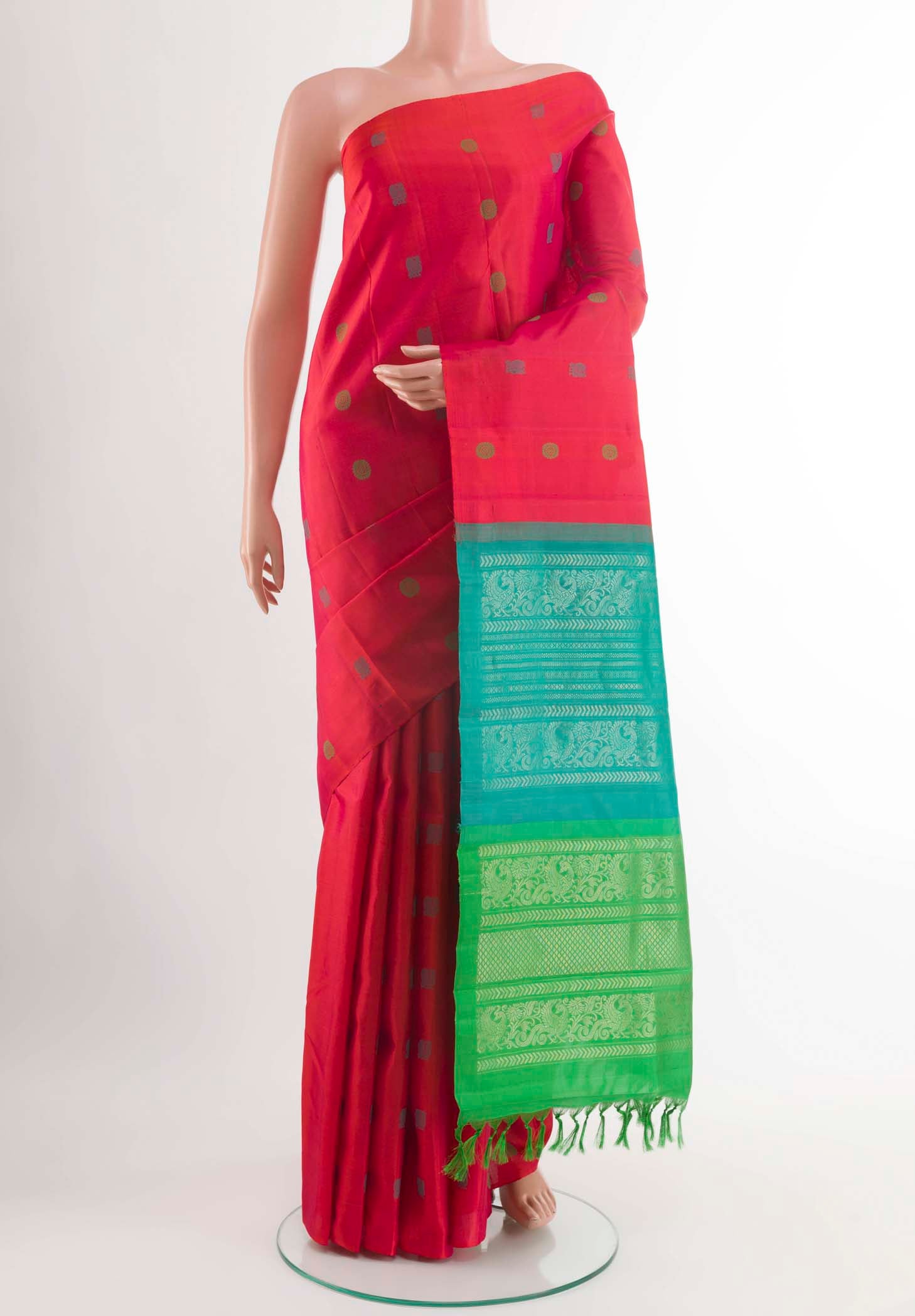 Pink Kanchipuram Silk Saree with Thread Butta on the body and Without Border displayed on a mannequin