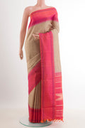 Olive Green Kanjivaram Silk Saree with Checked design on the body and Zari Border.  displayed on a mannequin