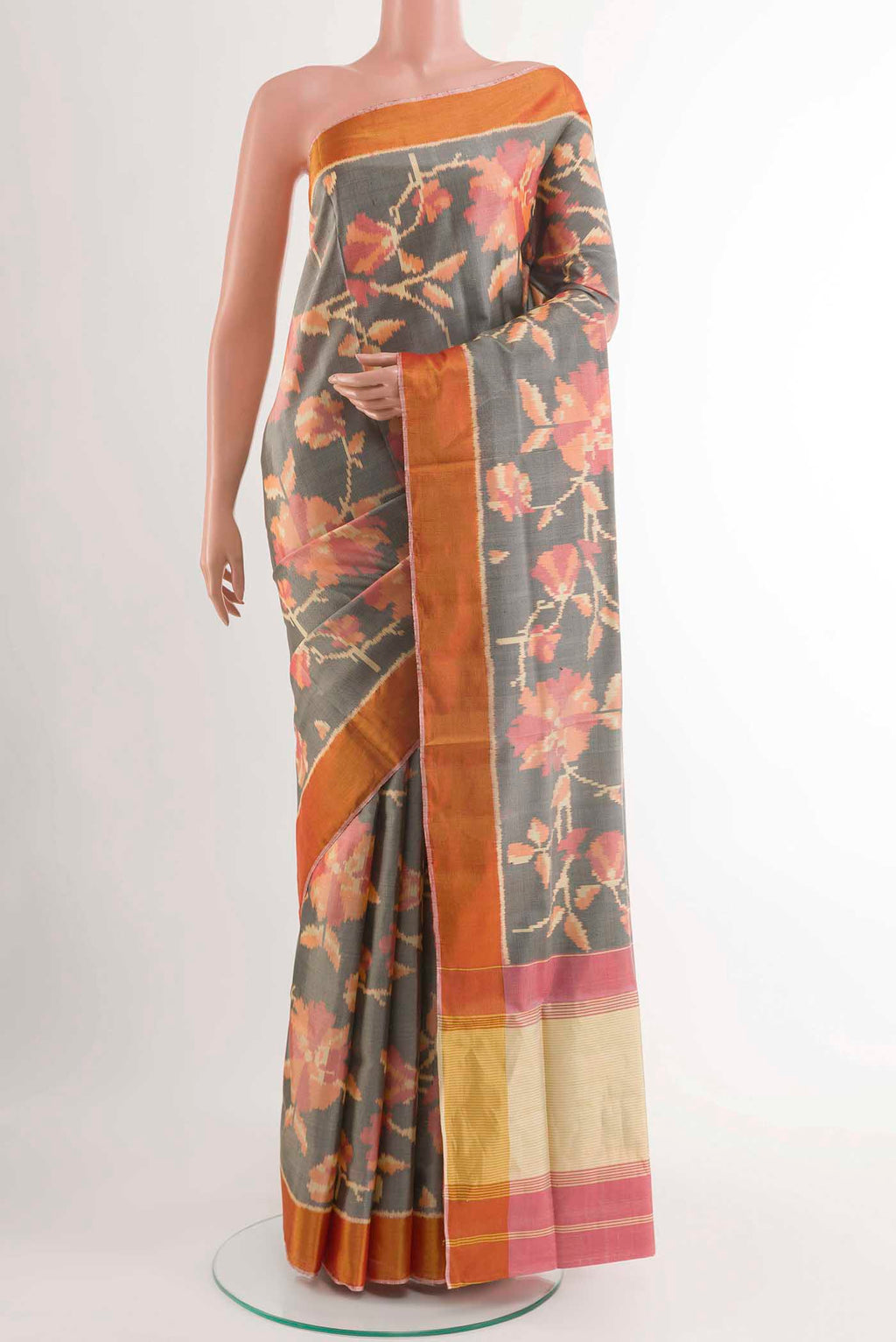 Grey Rajkot Patola Silk Saree with Pure Ikat on the body and Zari Border displayed on a mannequin