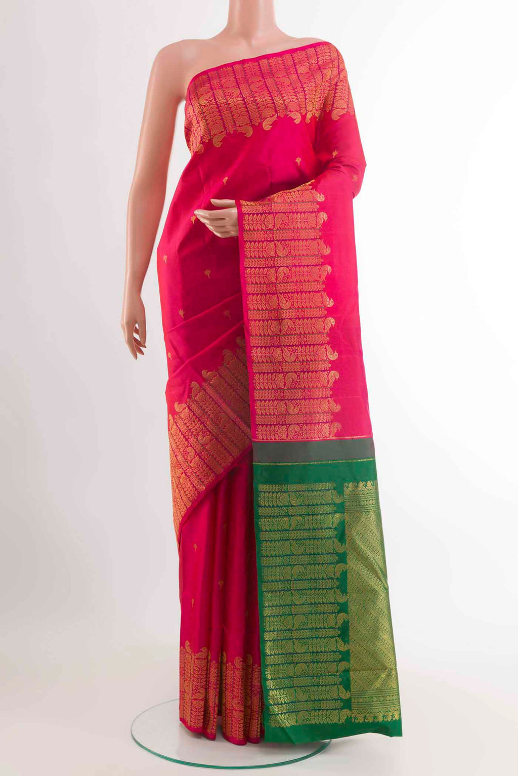 Pink Kanchipuram Silk Saree with Zari Butta on the body and Zari Border displayed on a mannequin