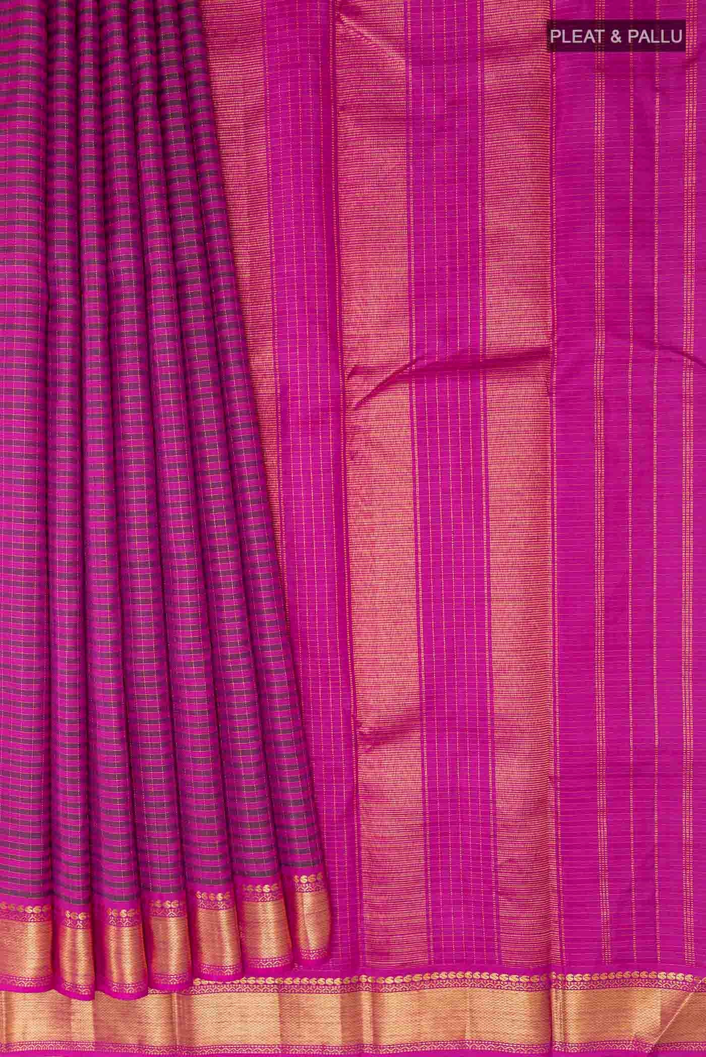 Pleats and pallu of Dark Pink Kanchipuram Silk Saree with Checked design on the body and Plain Border