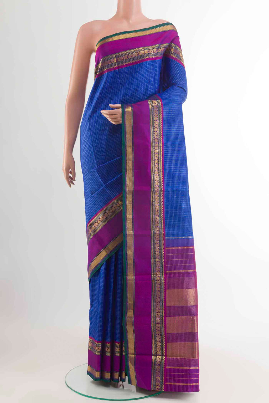Blue Kanchipuram Silk Saree with Checked design on the body and Zari Border displayed on a mannequin