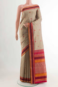 Beige Kanchipuram Silk Saree with Thread Butta on the body and Thread Border displayed on a mannequin
