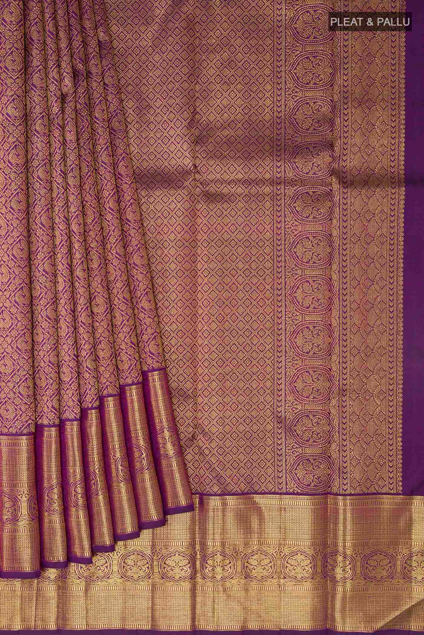 Pleats and pallu of Pure Silk Pure Zari Purple Kanchipuram Saree with Zari Brocade on the body and Zari Border
