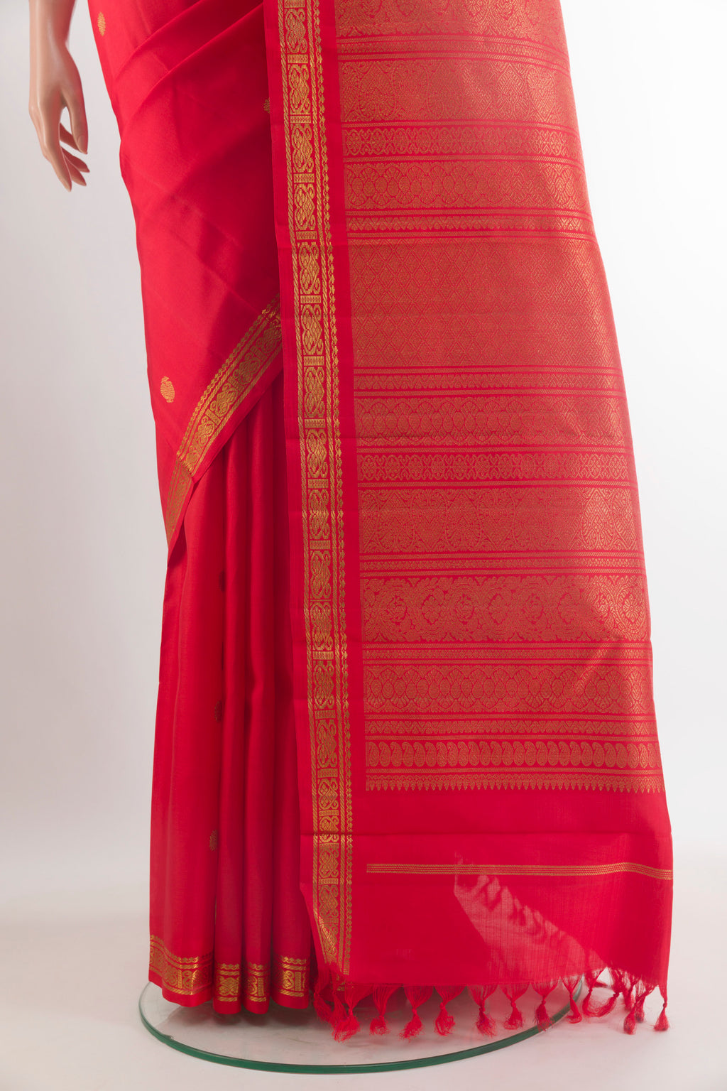Pleats and pallu of Pure Silk Pure Zari Red Kanchipuram Saree with Zari Brocade on the body and Zari Border. 