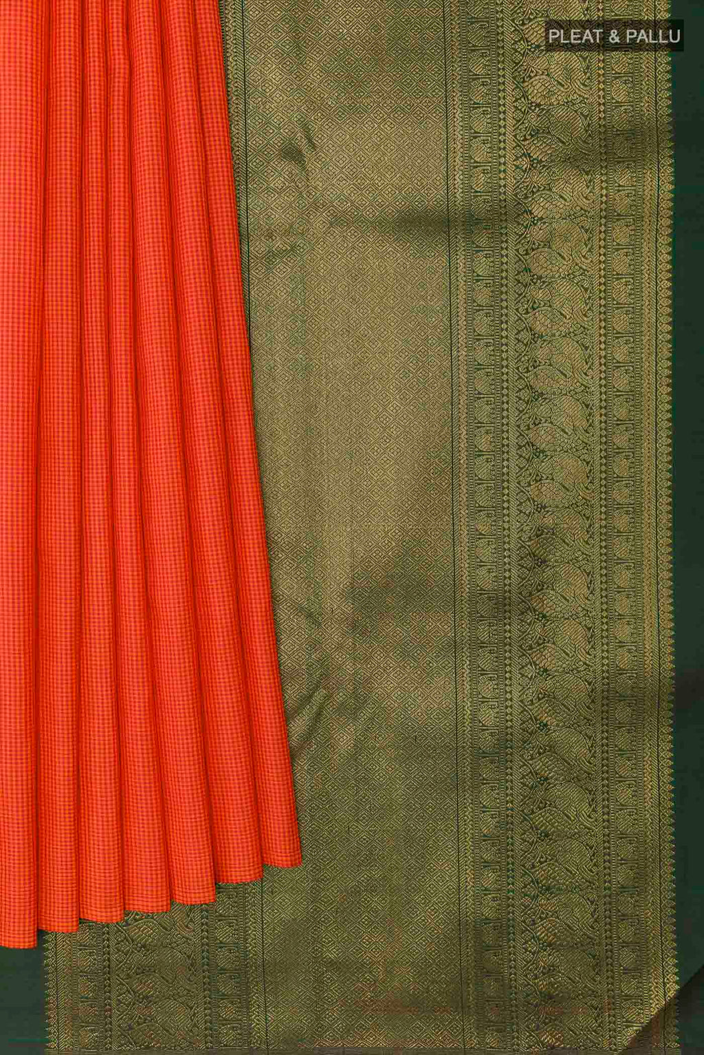 Pleats and pallu of Orange Kanchipuram Silk Saree with Checked design on the body and Without Border