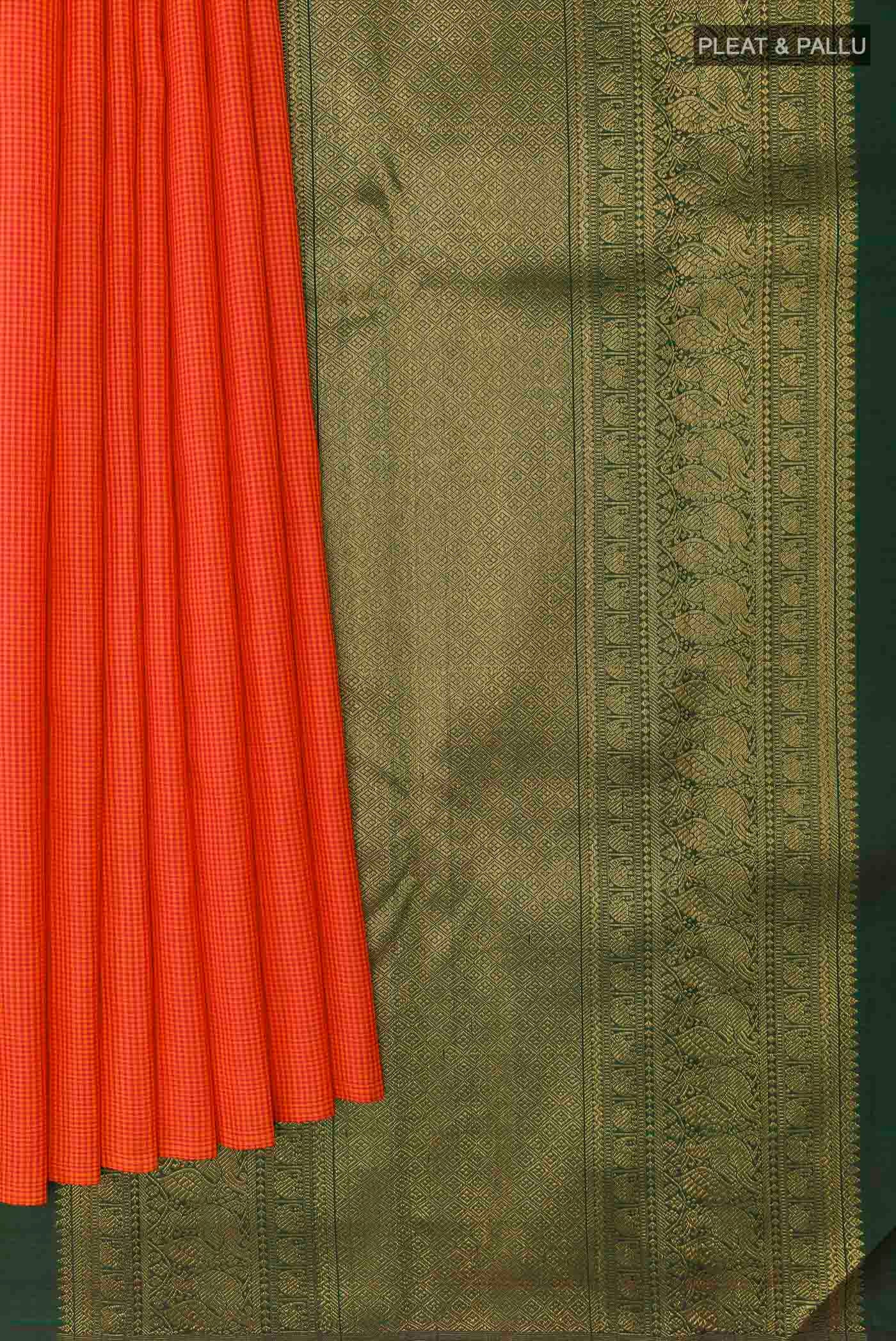 Pleats and pallu of Orange Kanchipuram Silk Saree with Checked design on the body and Without Border
