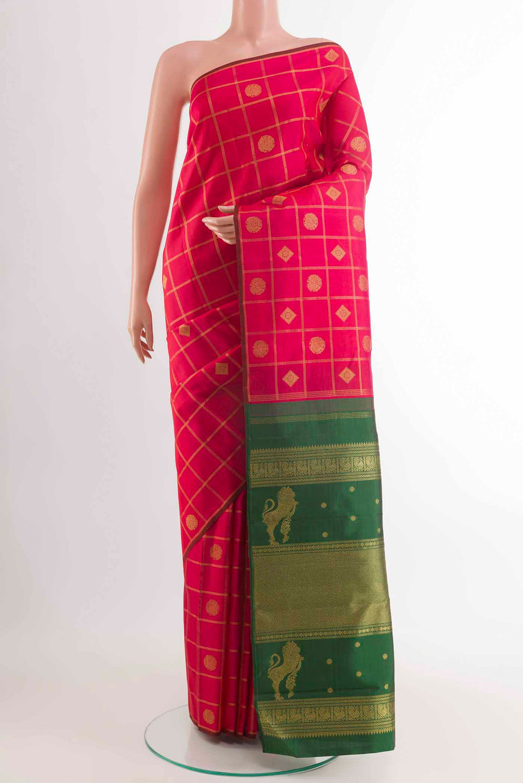 Pink Kanchipuram Silk Saree with Zari Butta on the body and Without Border displayed on a mannequin