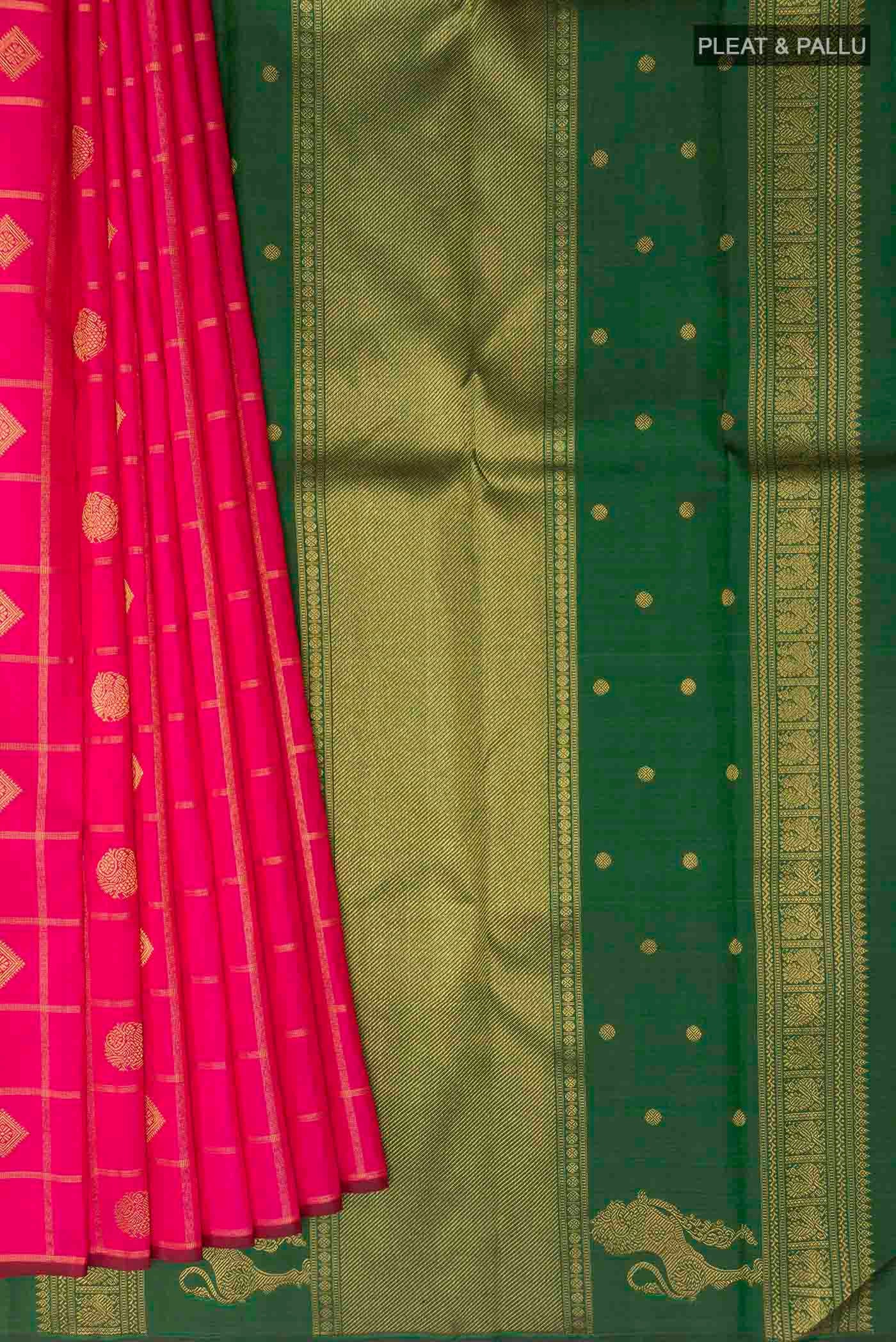 Pleats and pallu of Pink Kanchipuram Silk Saree with Zari Butta on the body and Without Border