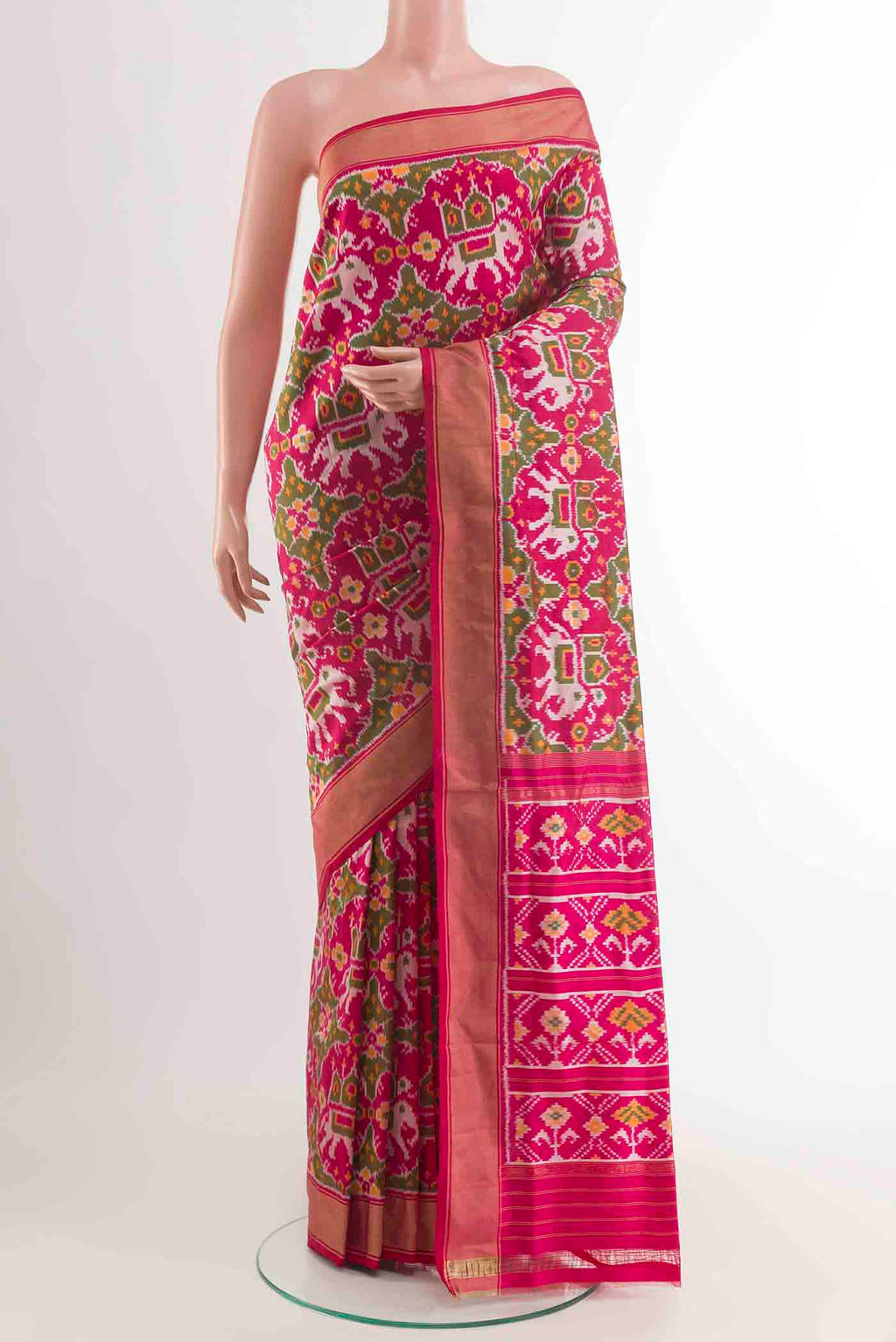 Pink Pochampally Silk Saree with Pure Ikat on the body and Zari Border displayed on a mannequin