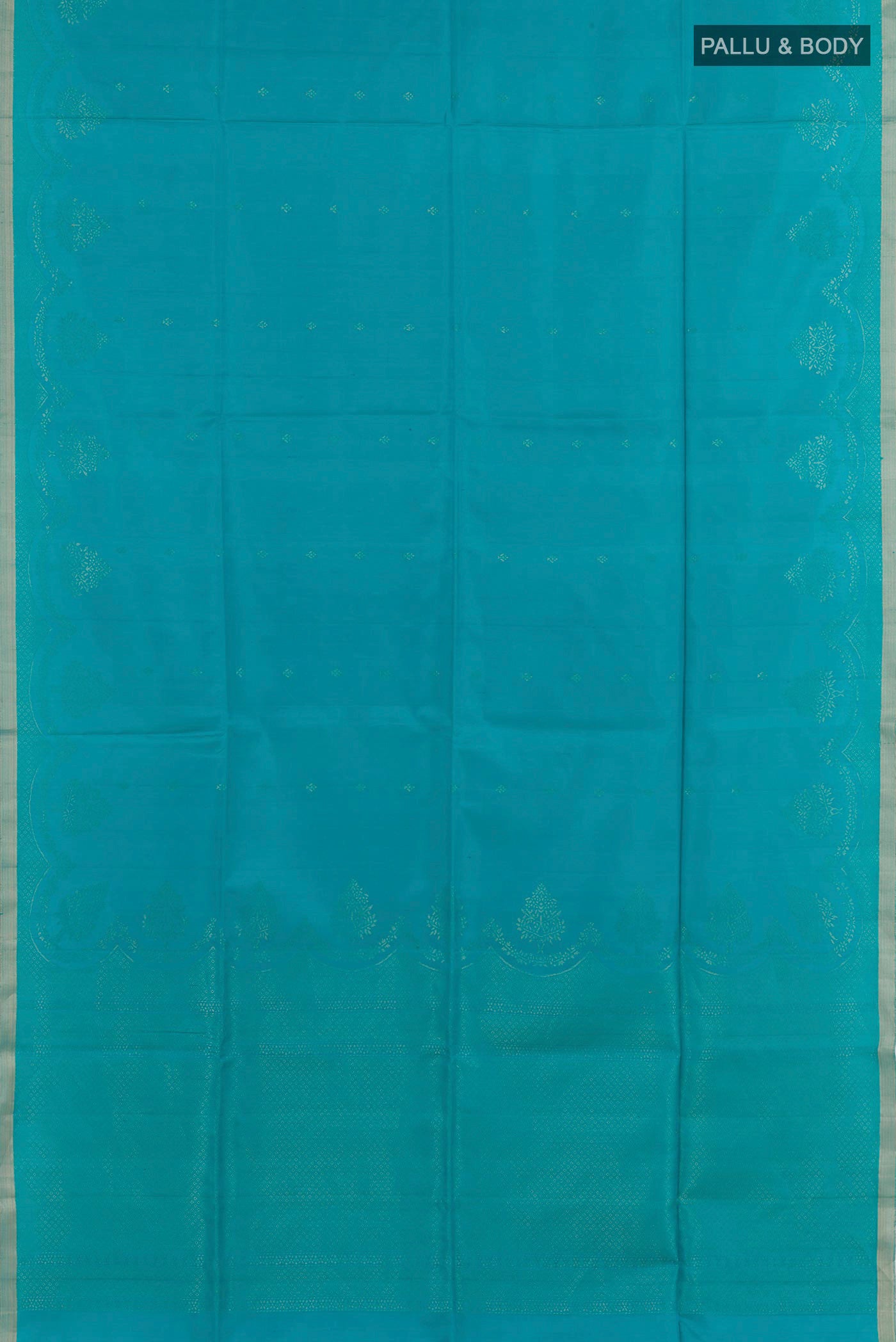 Flat view of Blue Soft Silk Saree with Zari Butta on the body and Zari Border. 
