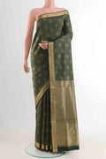 Green Soft Silk Saree with Zari Brocade on the body and Zari Border displayed on a mannequin
