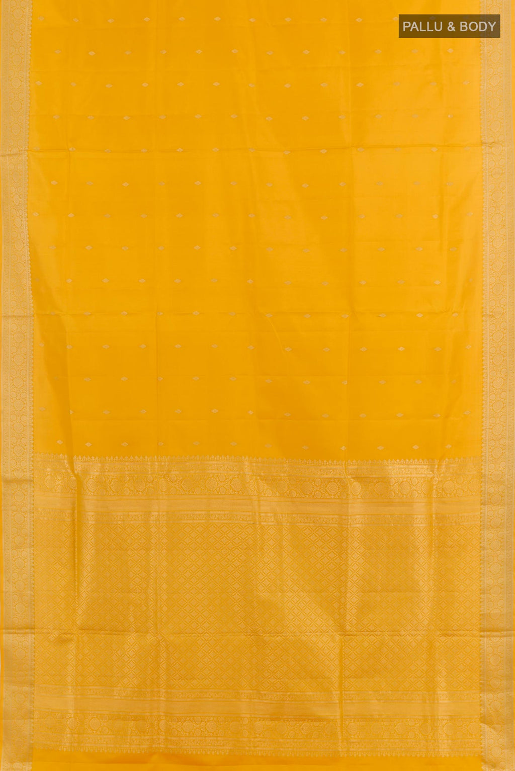 Flat view of Yellow Soft Silk Saree with Zari Butta on the body and Zari Border. 