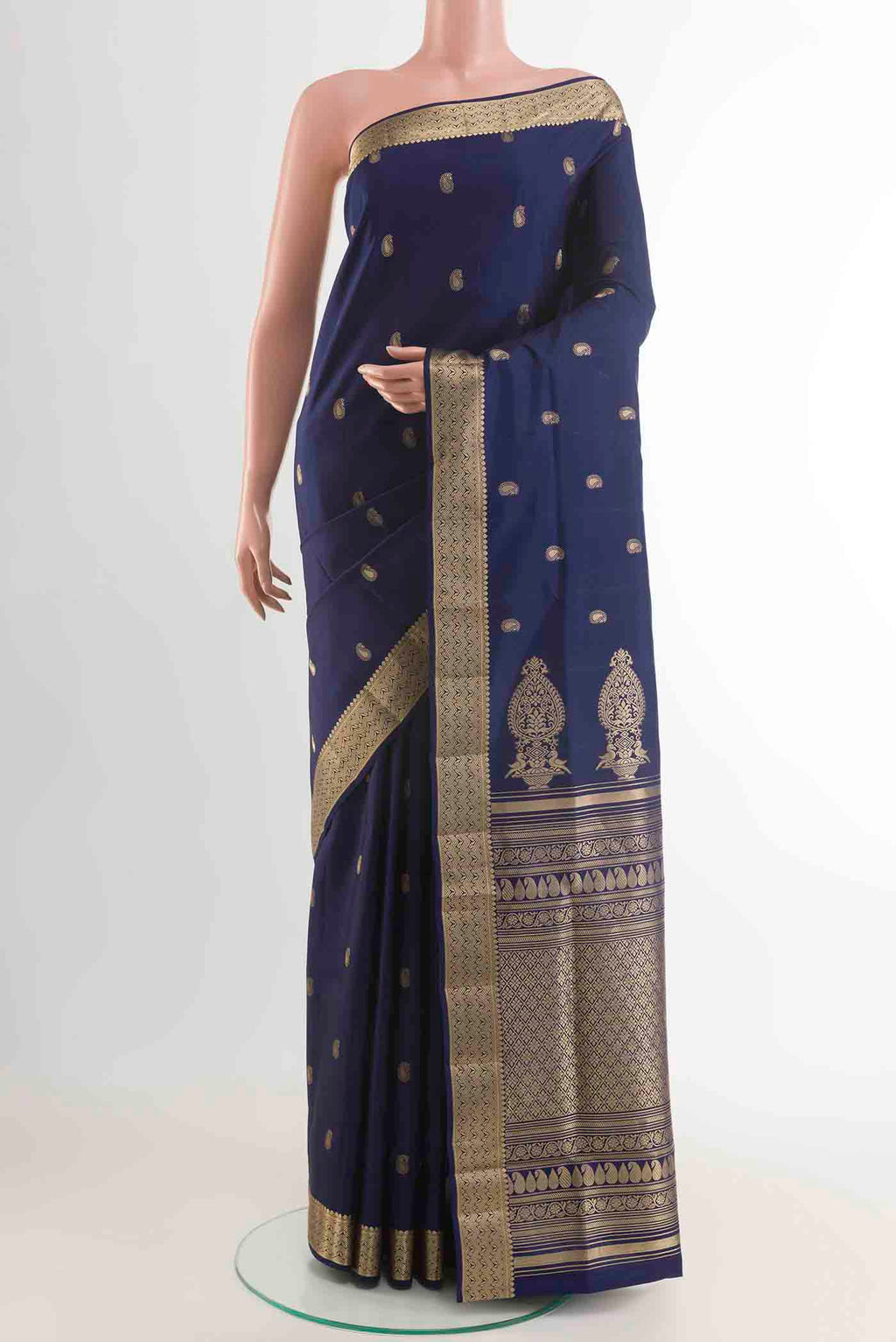 Blue Soft Silk Saree with Zari Butta on the body and Zari Border displayed on a mannequin