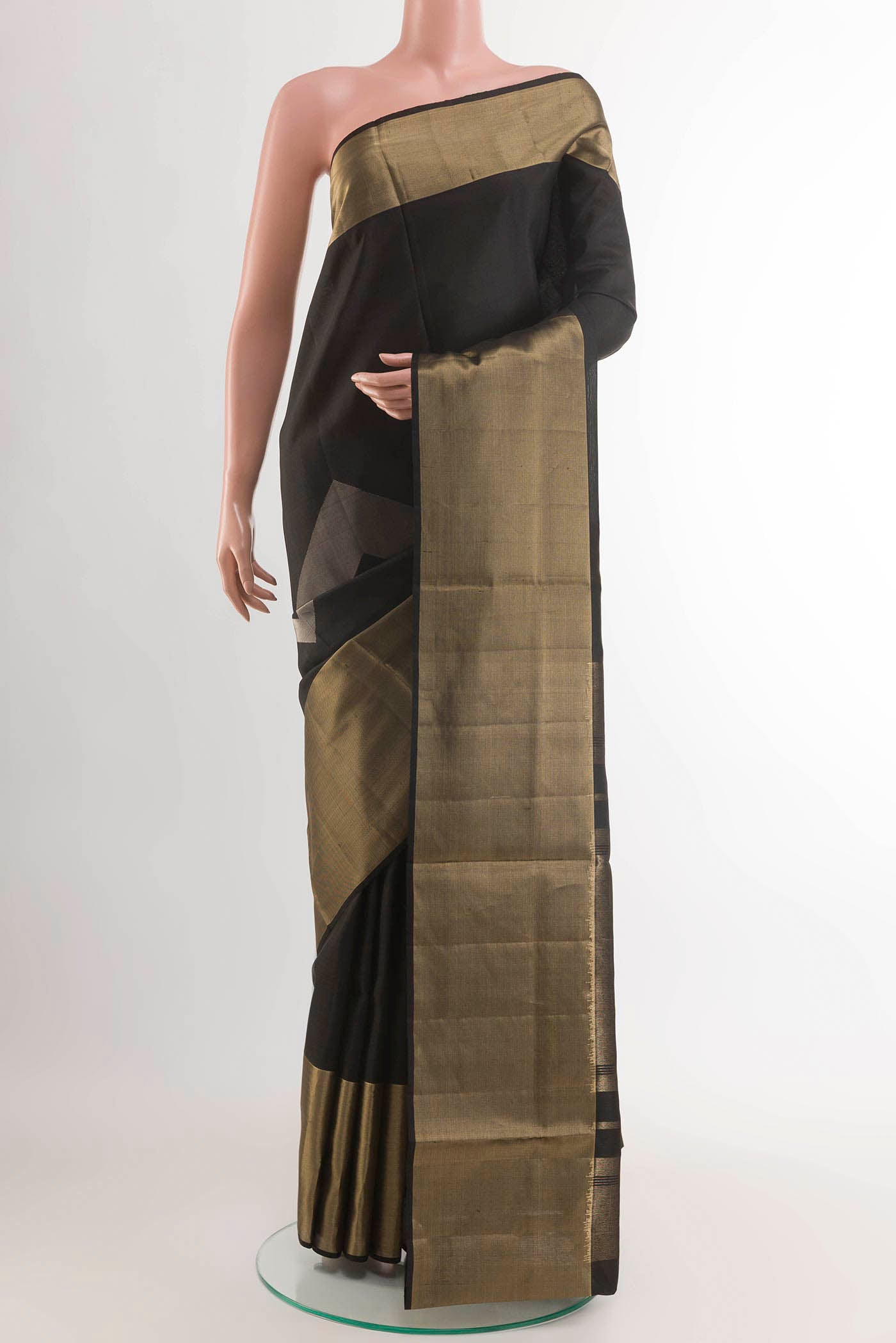 Black Soft Silk Saree with Zari Butta on the body and Zari Border displayed on a mannequin