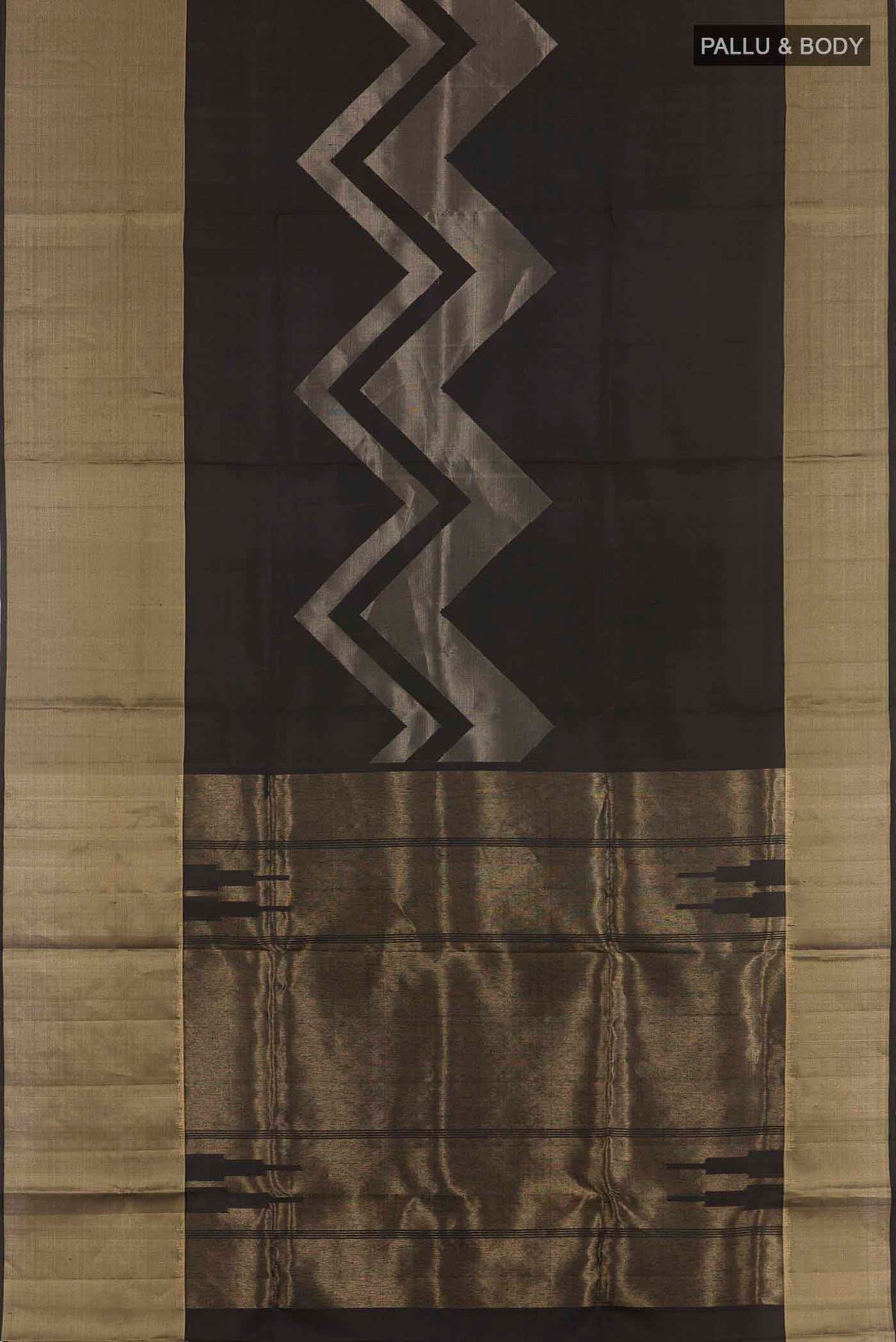 Flat view of Black Soft Silk Saree with Zari Butta on the body and Zari Border