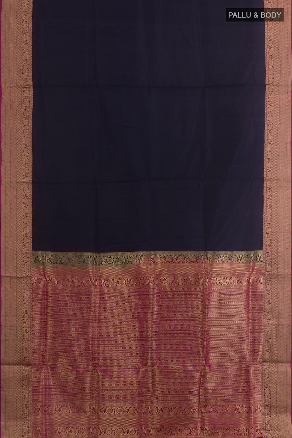 Flat view of Navy Blue Soft Silk Saree with Plain Body and Zari Border. 