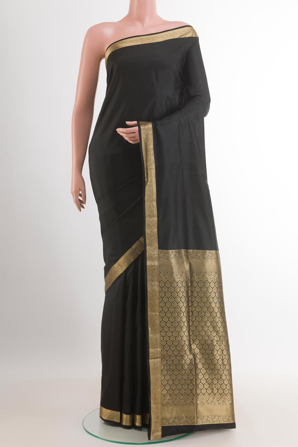 Black Soft Silk Saree with Plain Body and Zari Border.  displayed on a mannequin