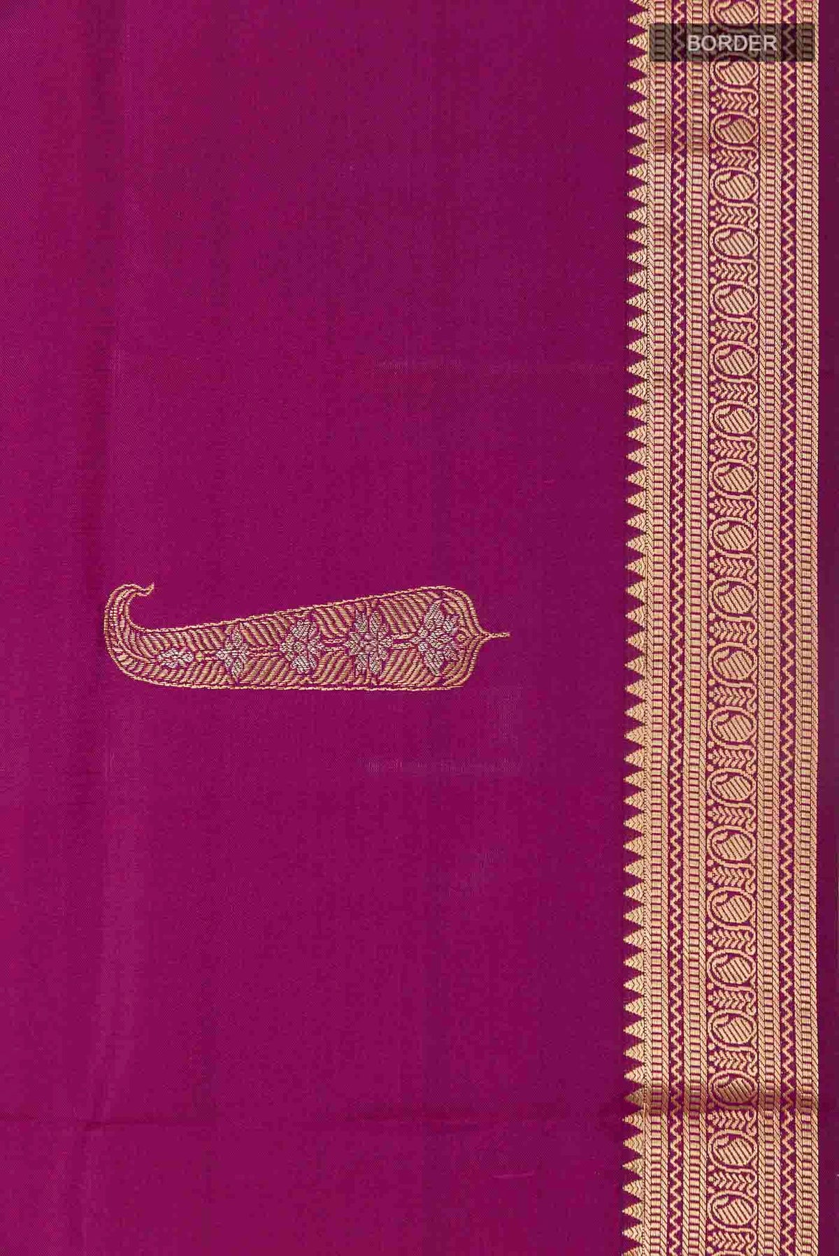 Border image of Purple Soft Silk Saree with Zari Butta on the body and Zari Border