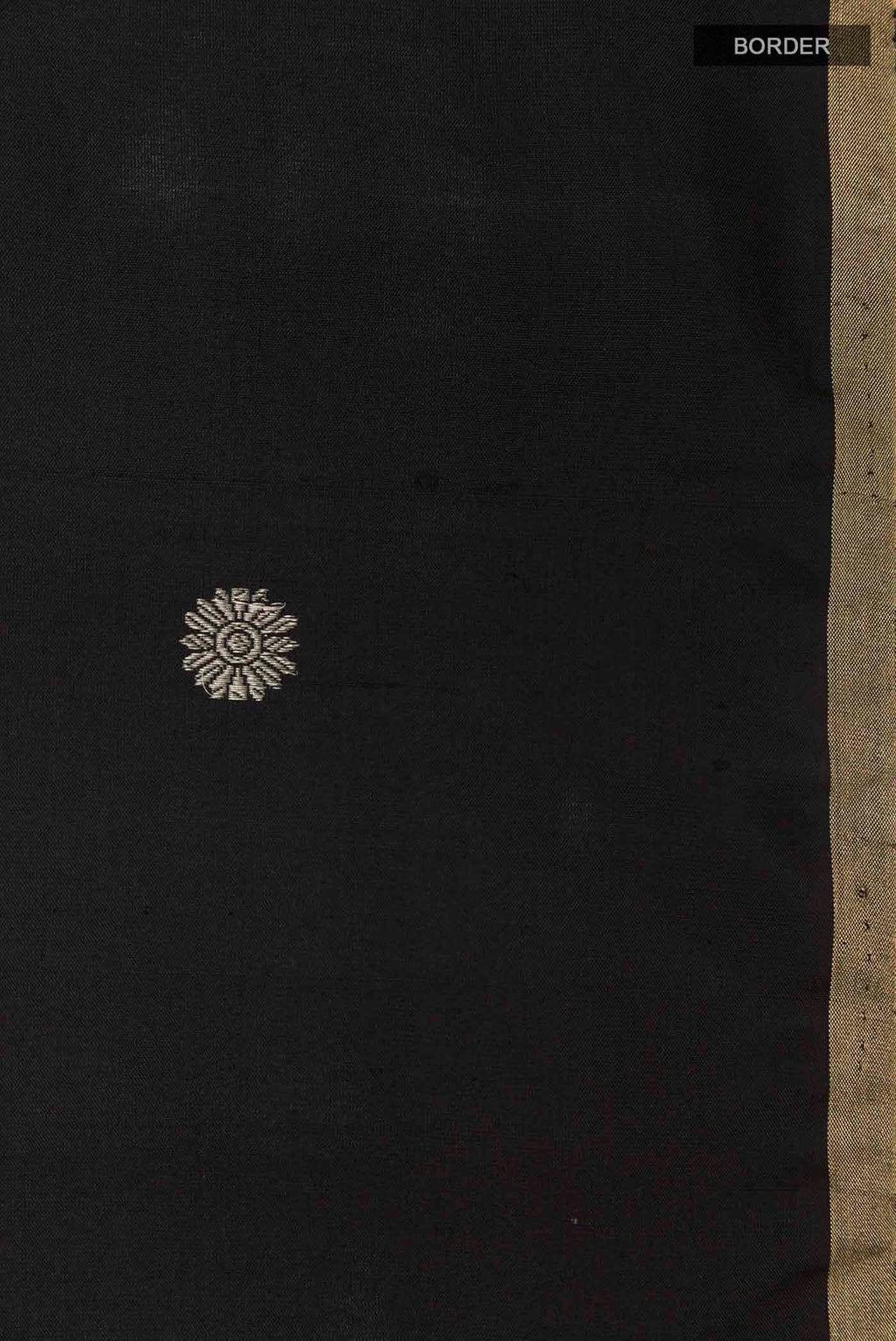 Border image of Black Soft Silk Saree with Zari Butta on the body and Zari Border