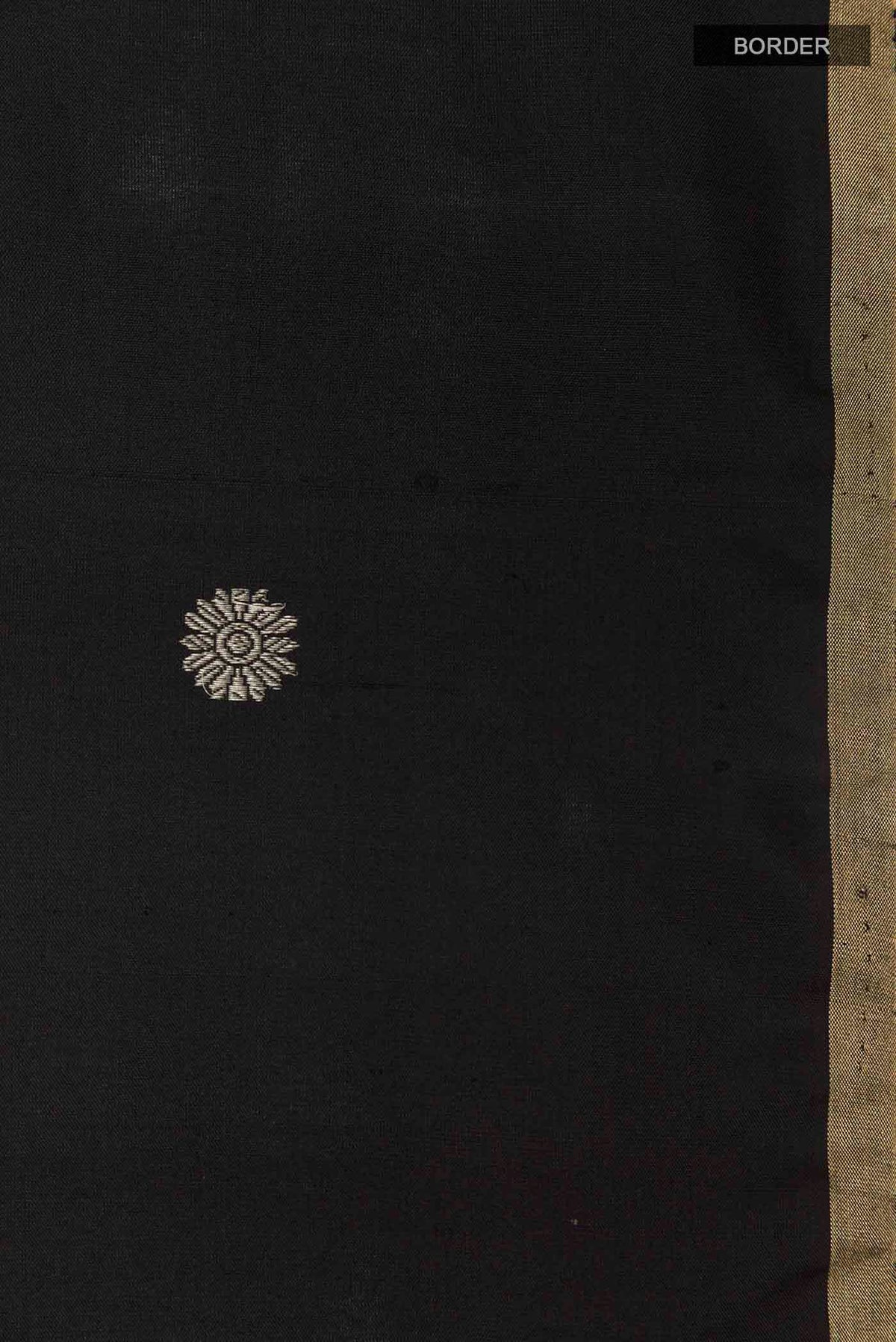 Border image of Black Soft Silk Saree with Zari Butta on the body and Zari Border