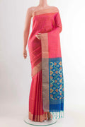 Peach Soft Silk Saree with Checked design on the body and Zari Border displayed on a mannequin