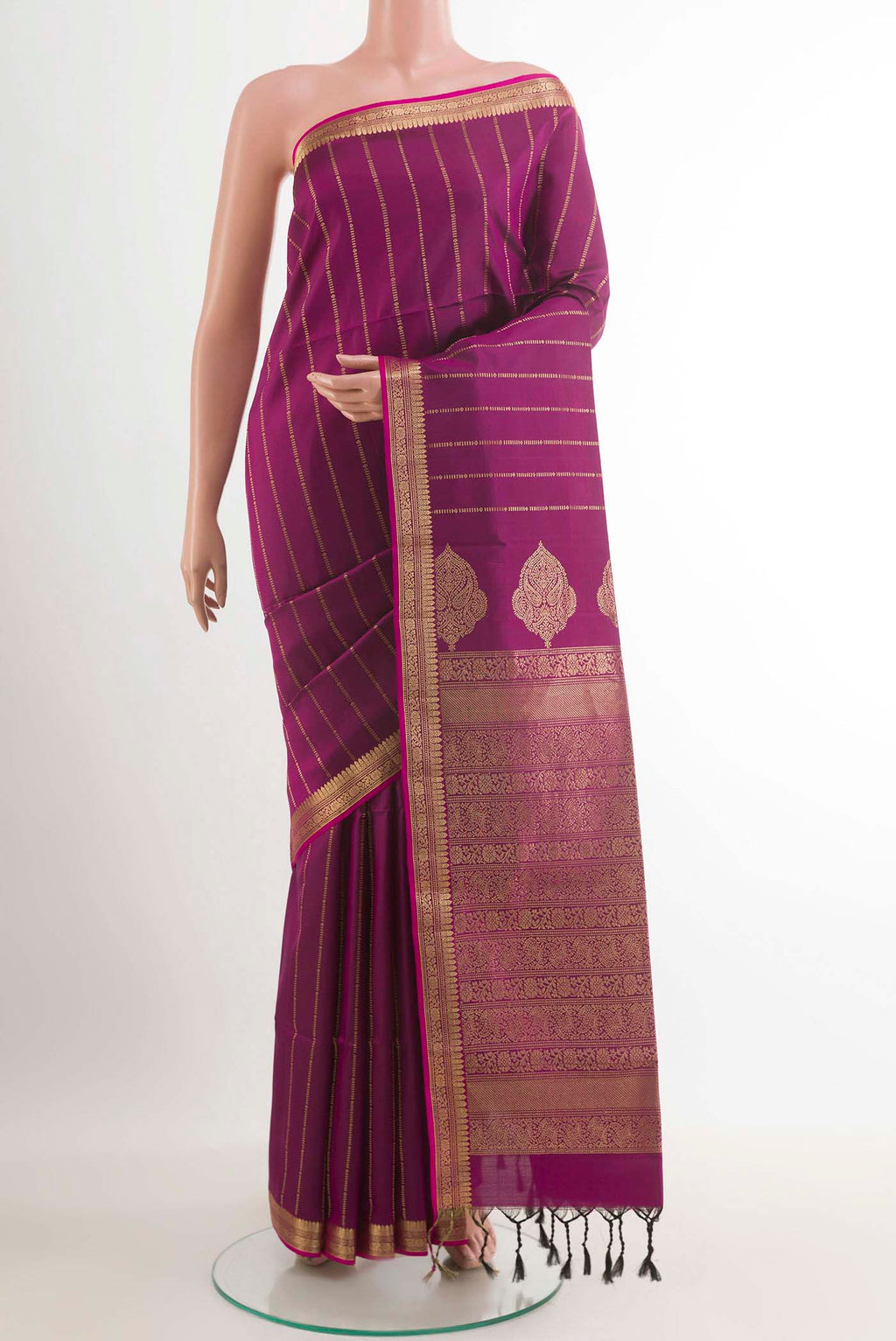 Pure Silk Pure Zari Purple Soft Saree with Stripes on the body and Zari Border.  displayed on a mannequin