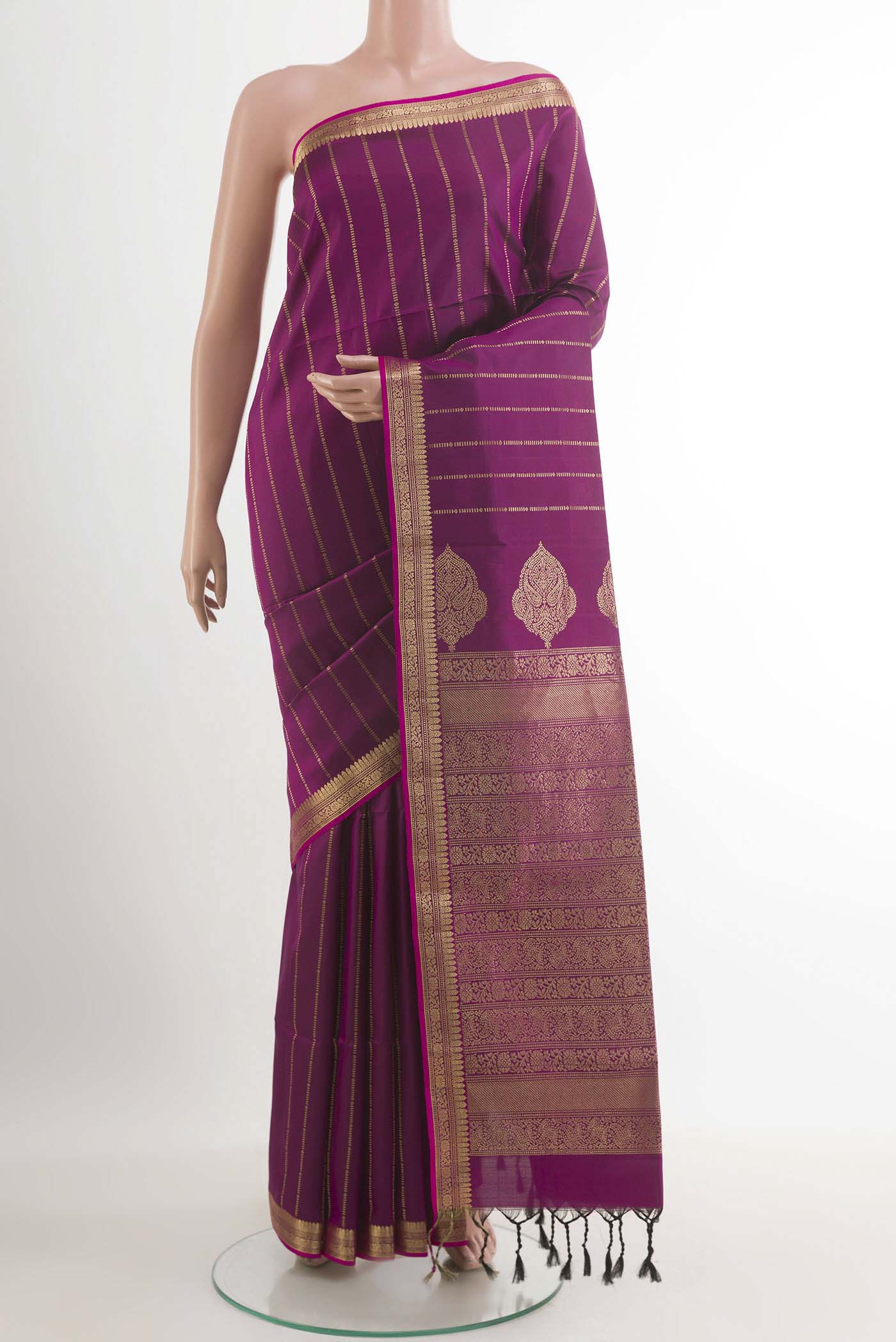 Pure Silk Pure Zari Purple Soft Saree with Stripes on the body and Zari Border.  displayed on a mannequin