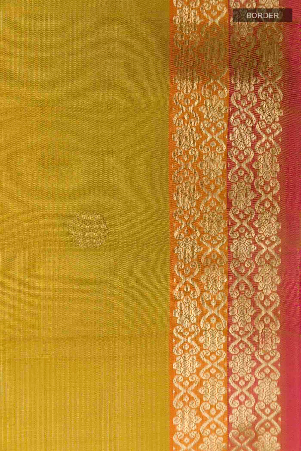 Border image of Yellow Soft Silk Saree with Zari Butta on the body and Zari Border
