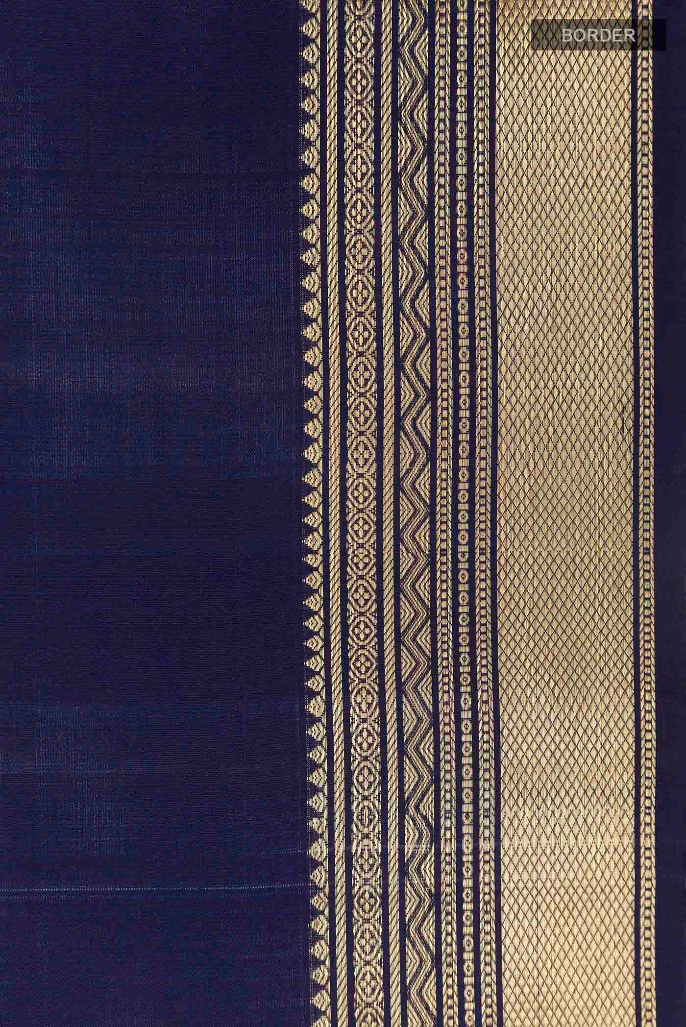 Border image of Blue Soft Silk Saree with Zari Butta on the body and Zari Border