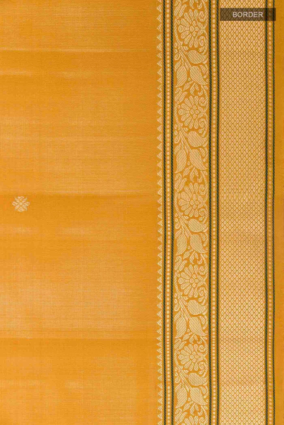 Border image of Mustard Soft Silk Saree with Zari Butta on the body and Zari Border