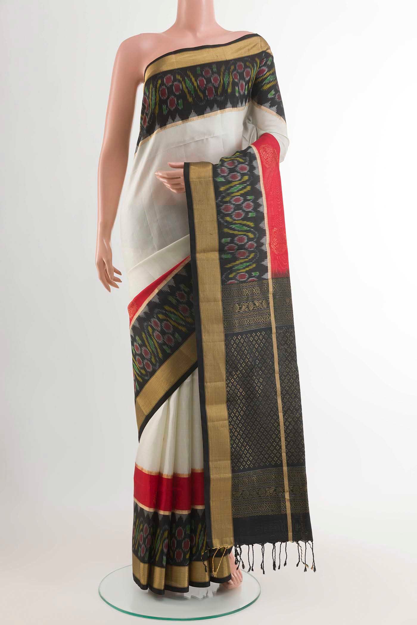 Off White Soft Silk Saree with Plain Body and Zari Border displayed on a mannequin