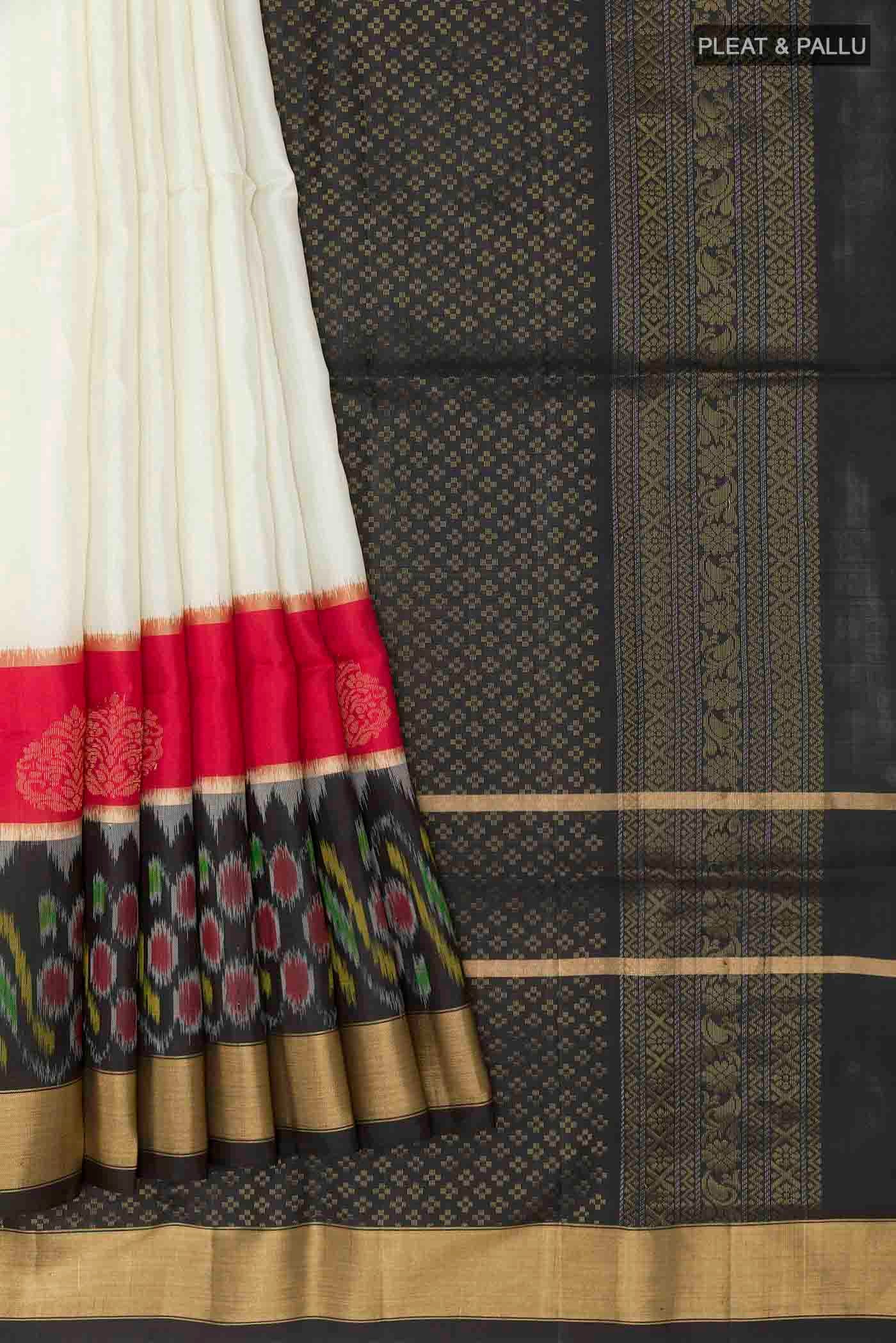 Pleats and pallu of Off White Soft Silk Saree with Plain Body and Zari Border
