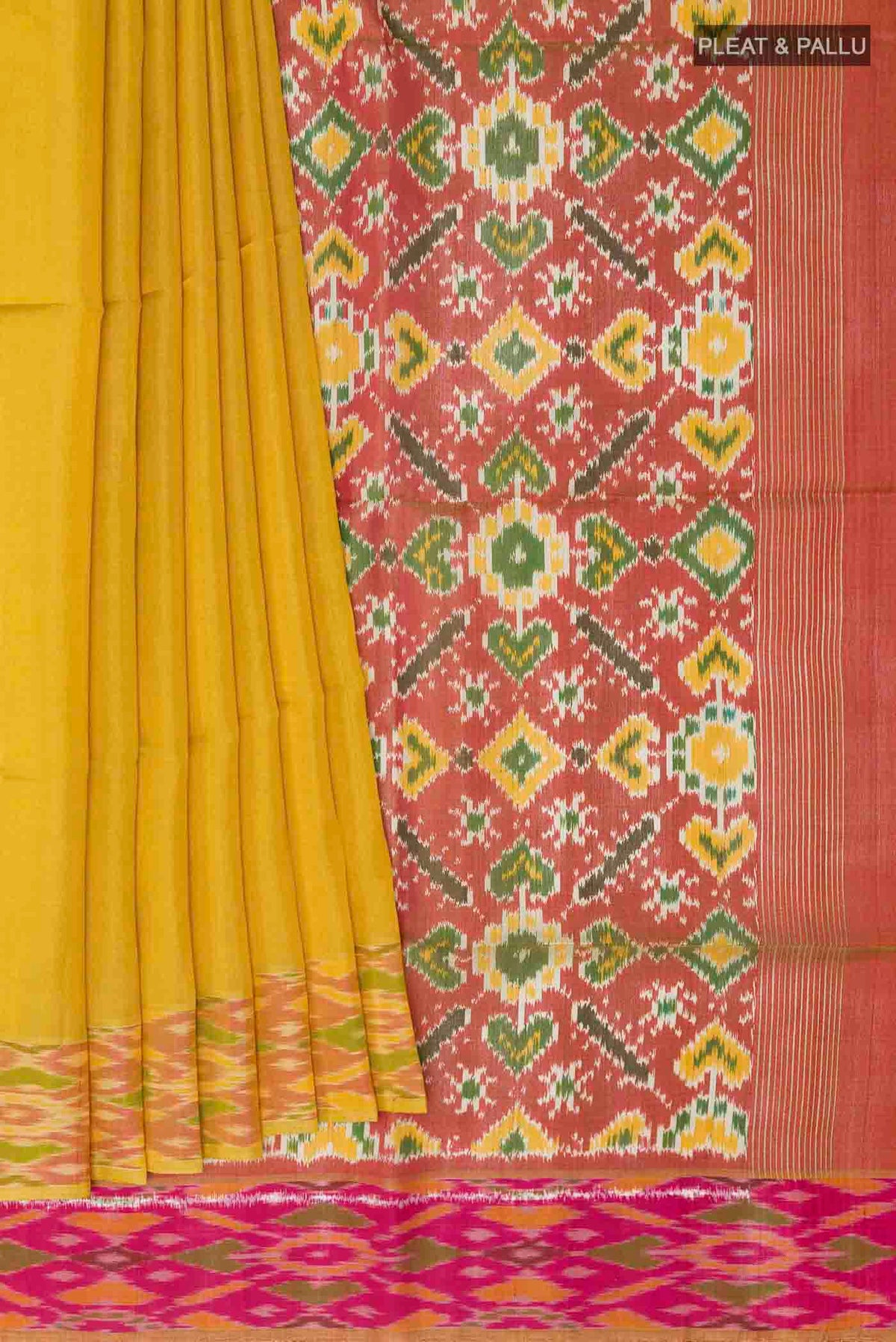 Pleats and pallu of Yellow Soft Silk Saree with Plain Body and Zari Border