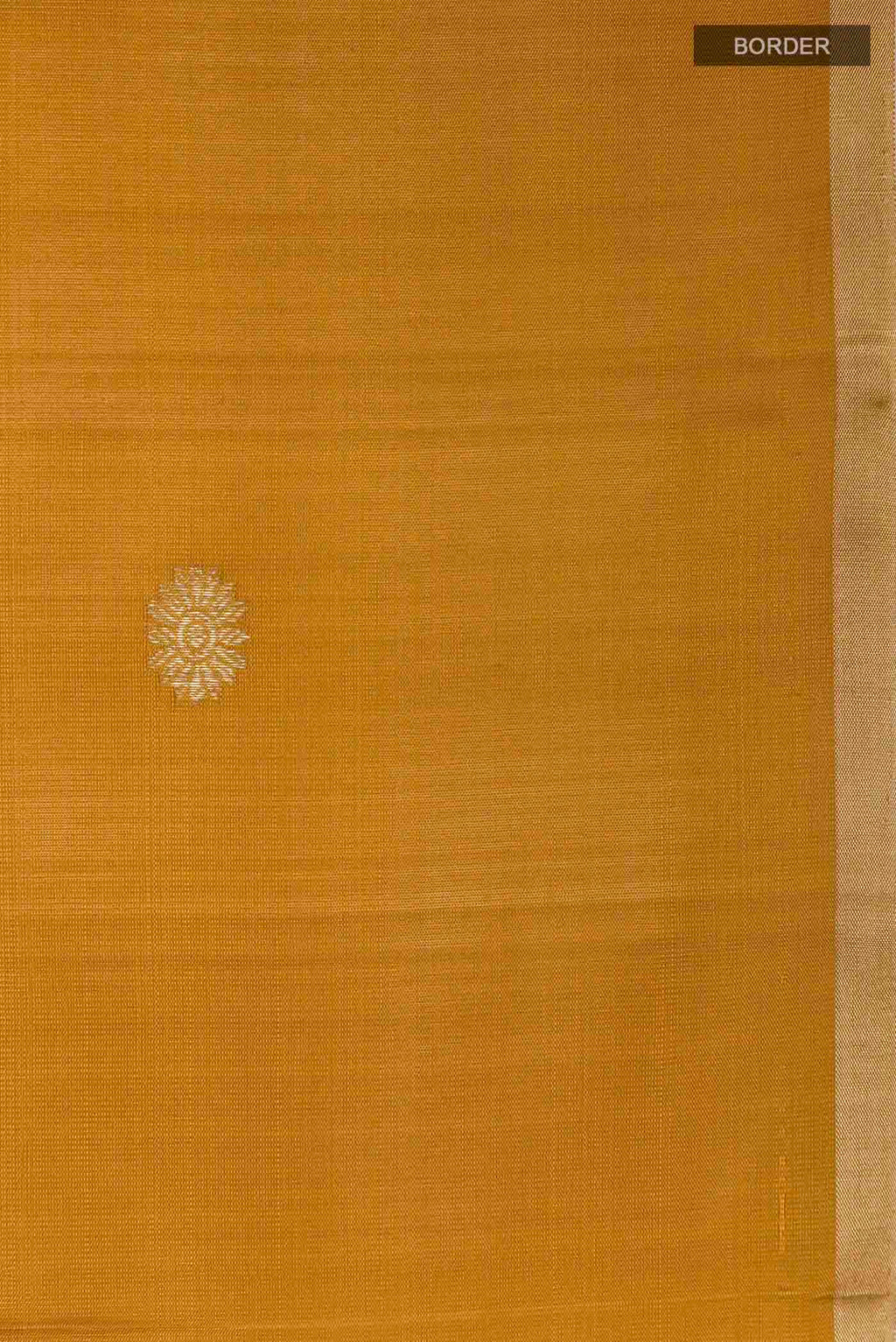 Border image of Yellow Soft Silk Saree with Zari Butta on the body and Zari Border