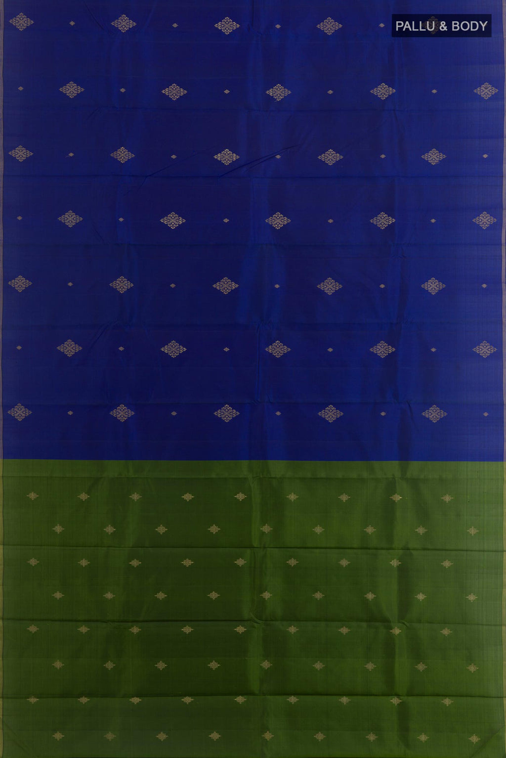 Flat view of Blue Kanchipuram Silk Saree with Zari Butta on the body and Thin Zari Line. 