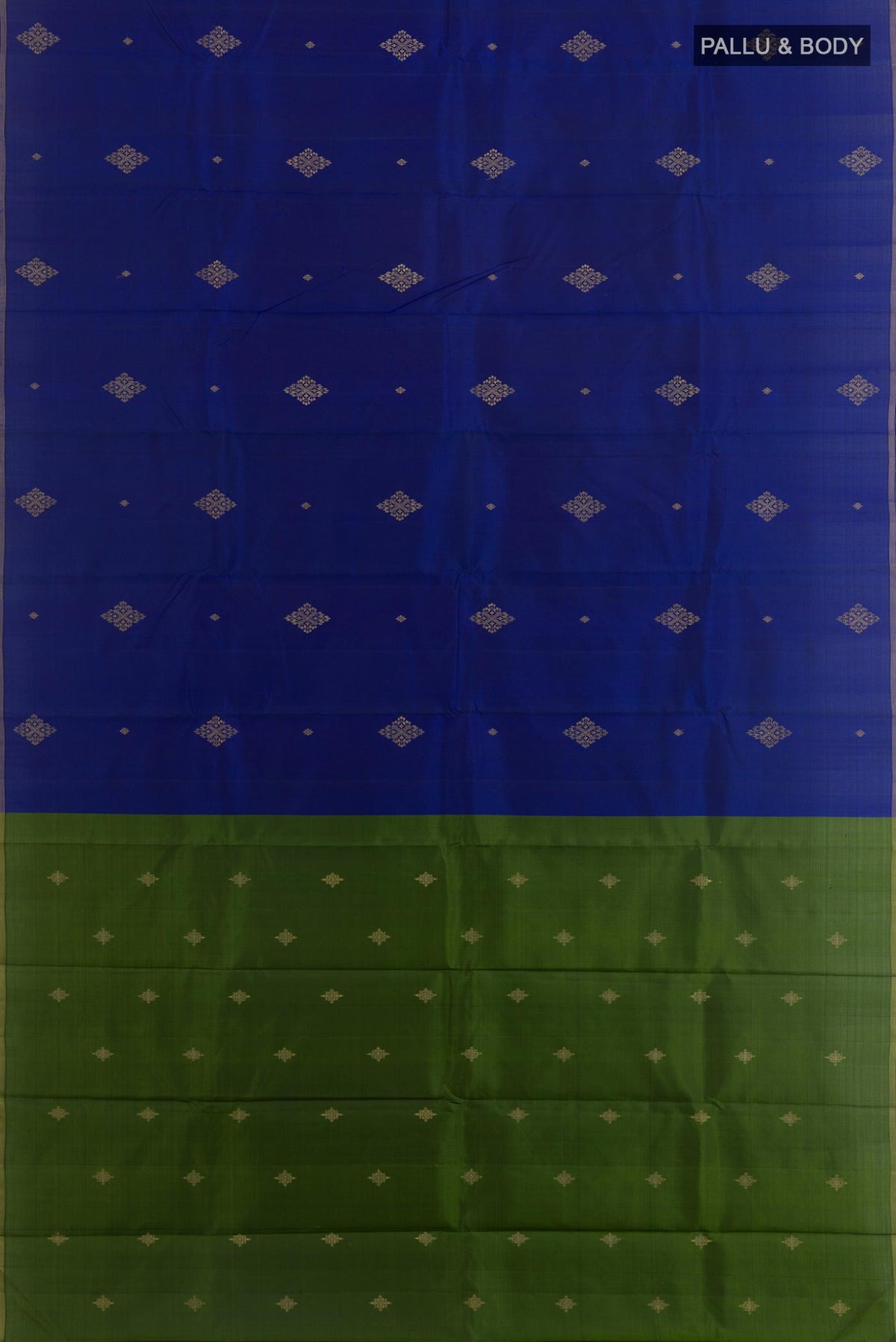 Flat view of Blue Kanchipuram Silk Saree with Zari Butta on the body and Thin Zari Line. 